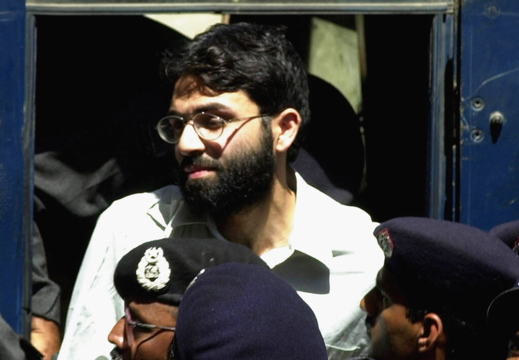 In this March 29, 2002 file photo, Ahmed Omar Saeed Sheikh, the alleged mastermind behind Wall Street Journal reporter Daniel Pearl's kidnap-slaying, appears at the court in Karachi, Pakistan. (AP Photo/Zia Mazhar, File)