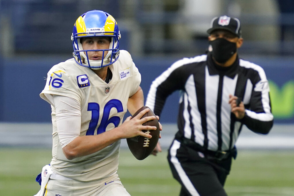 Los Angeles Rams quarterback Jared Goff (16) looks to pass against the Seattle Seahawks during the second half of an NFL football game, Sunday, Dec. 27, 2020, in Seattle. (AP Photo/Elaine Thompson)