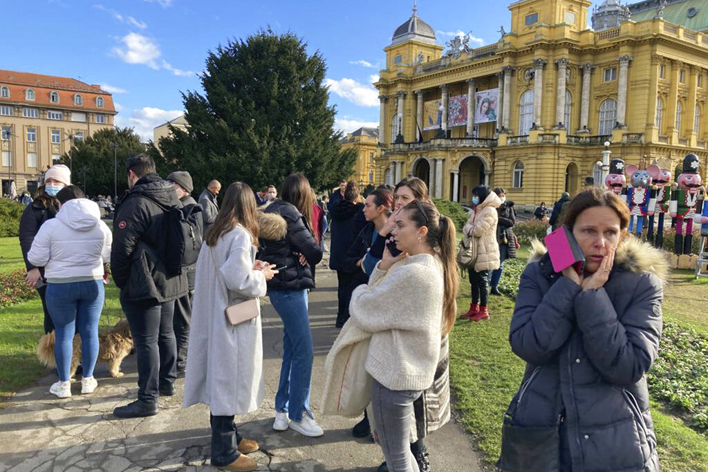 Residents gather outside after an earthquake, at a square in downtown Zagreb, Croatia, Tuesday, Dec. 29, 2020. (AP Photo/Filip Horvat)