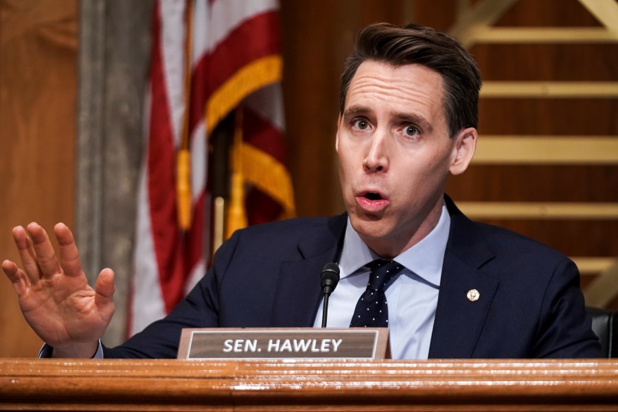 In this Dec. 16, 2020 file photo, Sen. Josh Hawley, R-Mo., asks questions during a Senate Homeland Security & Governmental Affairs Committee hearing to discuss election security and the 2020 election process on Capitol Hill in Washington. Walmart apologized on Wednesday, Dec. 30, for a tweet that called Hawley a sore loser for contesting the U.S. presidential election. The tweet from Walmart was in response to Hawley’s tweet announcing his plans to raise objections next week when Congress meets to affirm President-elect Joe Biden’s victory in the election. (Greg Nash/Pool via AP, File)