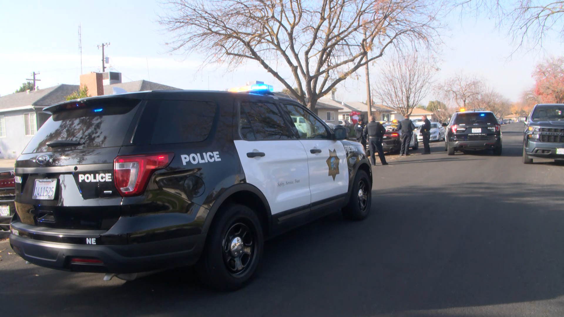 Police respond to rescue a college instructor who was taken hostage in her home in Fresno on Dec. 10, 2020. (KSEE)