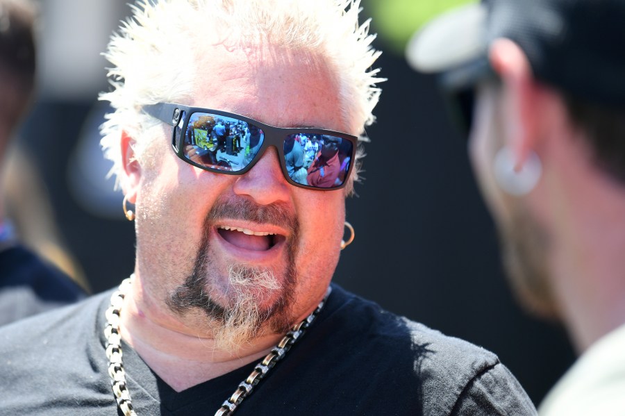 Celebrity chef Guy Fieri hangs out during qualifying for the Monster Energy NASCAR Cup Series Toyota/Save Mart 350 at Sonoma Raceway on June 22, 2019 in Sonoma. (Robert Reiners/Getty Images)