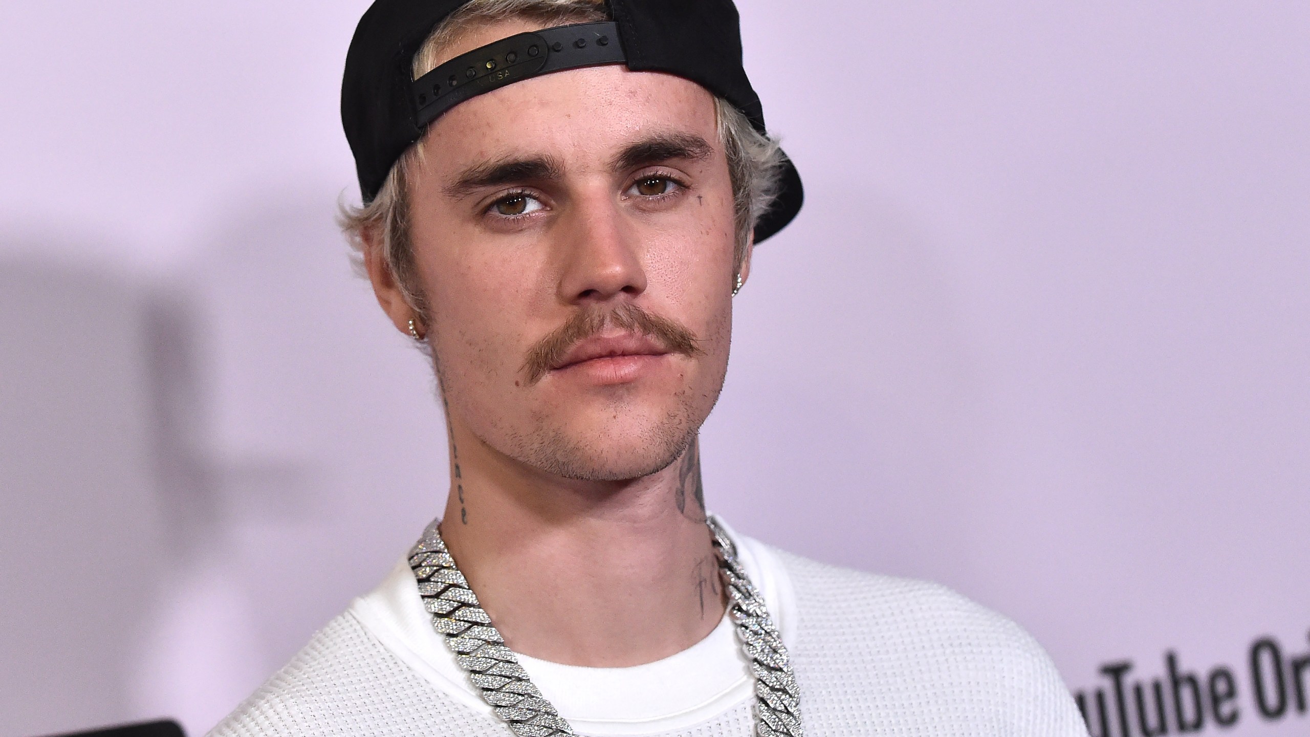 Canadian singer Justin Bieber arrives for YouTube Originals' "Justin Bieber: Seasons" premiere at the Regency Bruin Theatre in Los Angeles on Jan. 27, 2020. (LISA O'CONNOR/AFP via Getty Images)