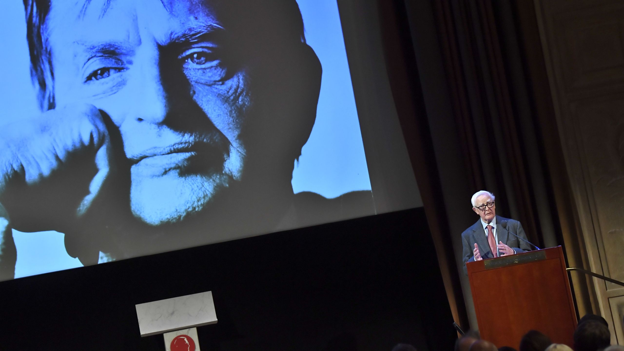 British author John le Carre speaks at the ceremony where he is awarded the Olof Palme Award 2019 "for his engaging and humanistic opinion making in literary form regarding the freedom of the individual and the fundamental issues of mankind" in the Concert Hall Grünewaldsalen, on Jan. 30, 2020 in Stockholm, Sweden. (CLAUDIO BRESCIANI/TT News Agency/AFP via Getty Images)