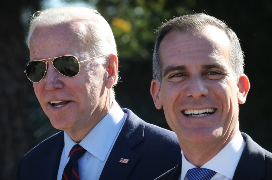 Then-Democratic presidential candidate and former U.S. Vice President Joe Biden (L) walks with Los Angeles Mayor Eric Garcetti at a campaign event at United Firefighters of Los Angeles City on Jan. 10, 2020. (Mario Tama/Getty Images)