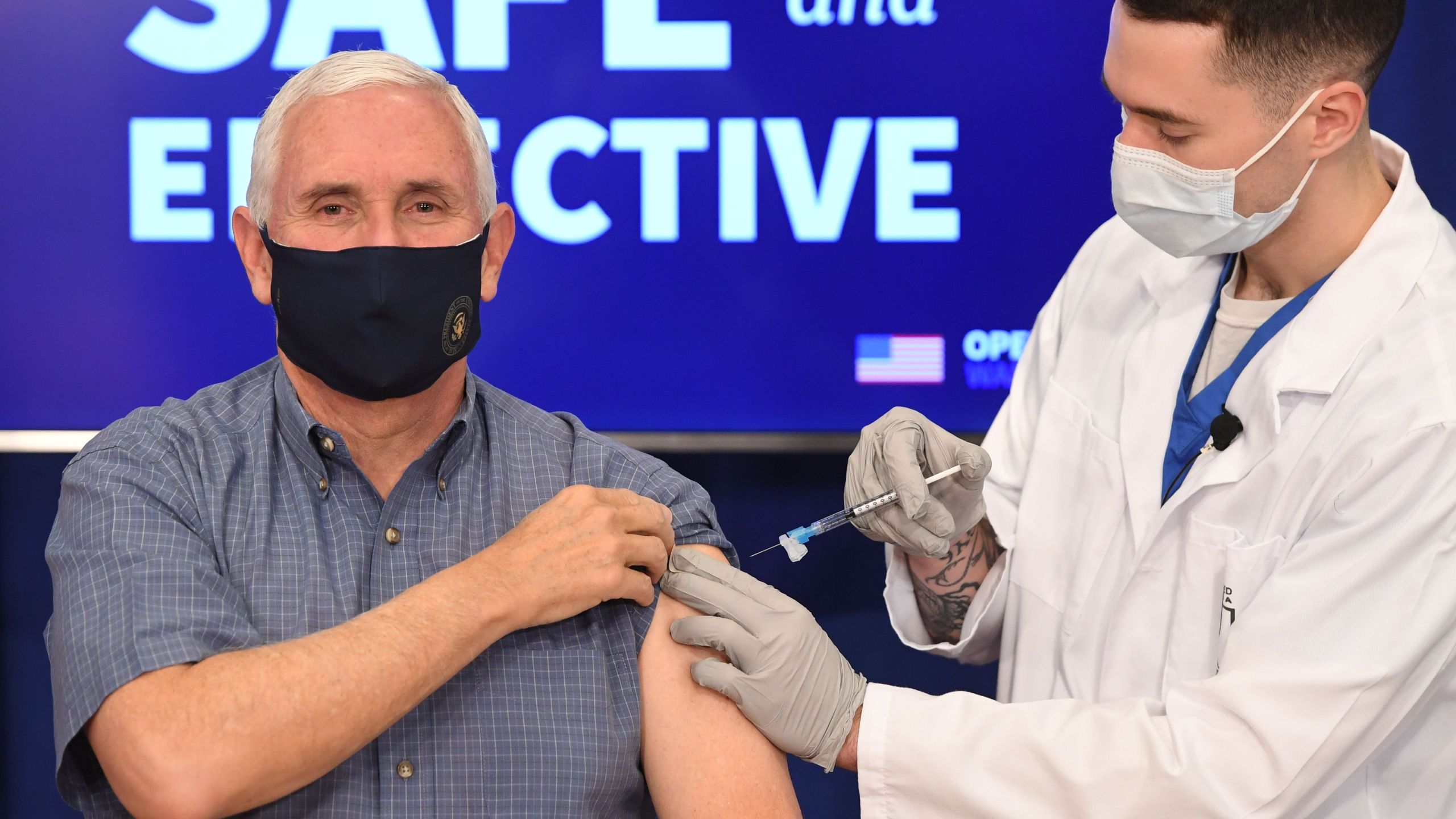 US Vice President Mike Pence receives the COVID-19 vaccine in the Eisenhower Executive Office Building in Washington, DC, December 18, 2020. (Photo by SAUL LOEB / AFP) (SAUL LOEB/AFP via Getty Images)