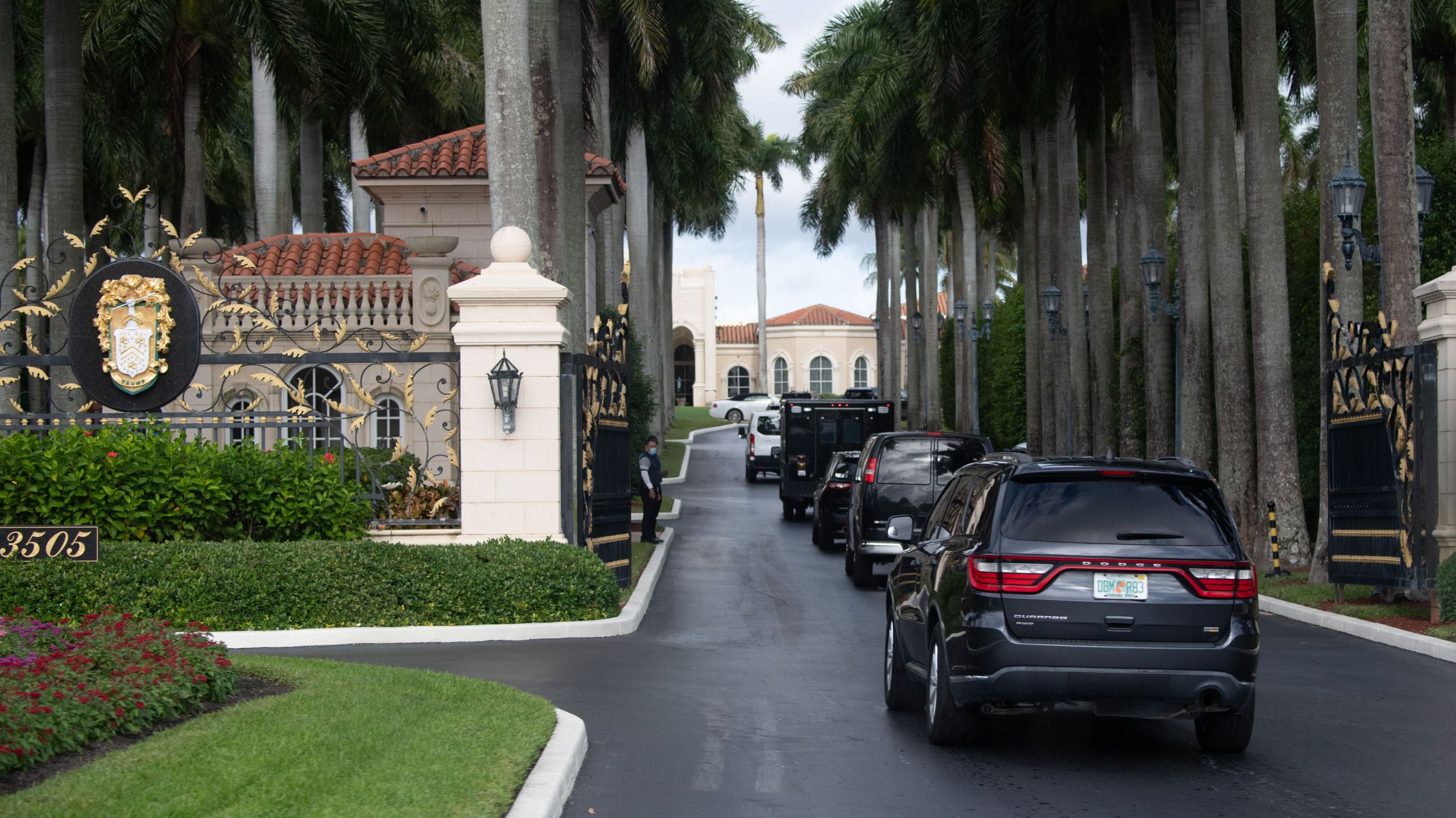 The motorcade of President Donald Trump arrives at Trump International Golf Club in West Palm Beach, Florida, on Dec. 24, 2020. (SAUL LOEB/AFP via Getty Images)