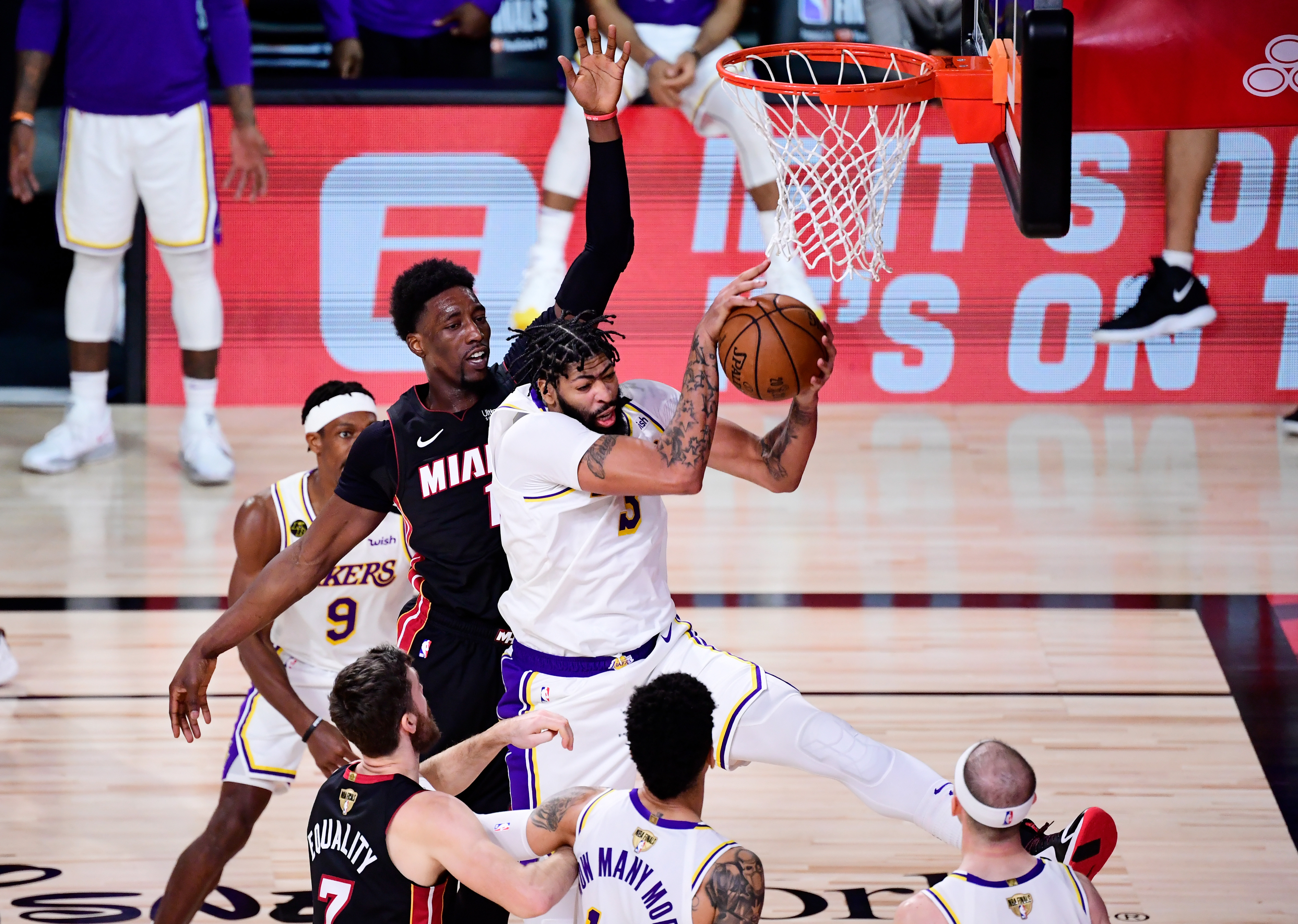 Anthony Davis #3 of the Los Angeles Lakers rebounds the ball against Bam Adebayo #13 of the Miami Heat during the fourth quarter in Game Six of the 2020 NBA Finals at AdventHealth Arena at the ESPN Wide World Of Sports Complex on Oct. 11, 2020 in Lake Buena Vista, Florida. (Douglas P. DeFelice/Getty Images)