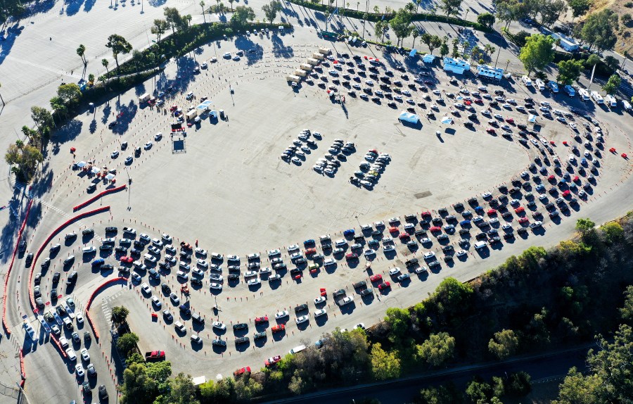 In an aerial view from a drone, cars are lined up at Dodger Stadium for COVID-19 testing on the Monday after Thanksgiving weekend on November 30, 2020 in Los Angeles. (Mario Tama/Getty Images)