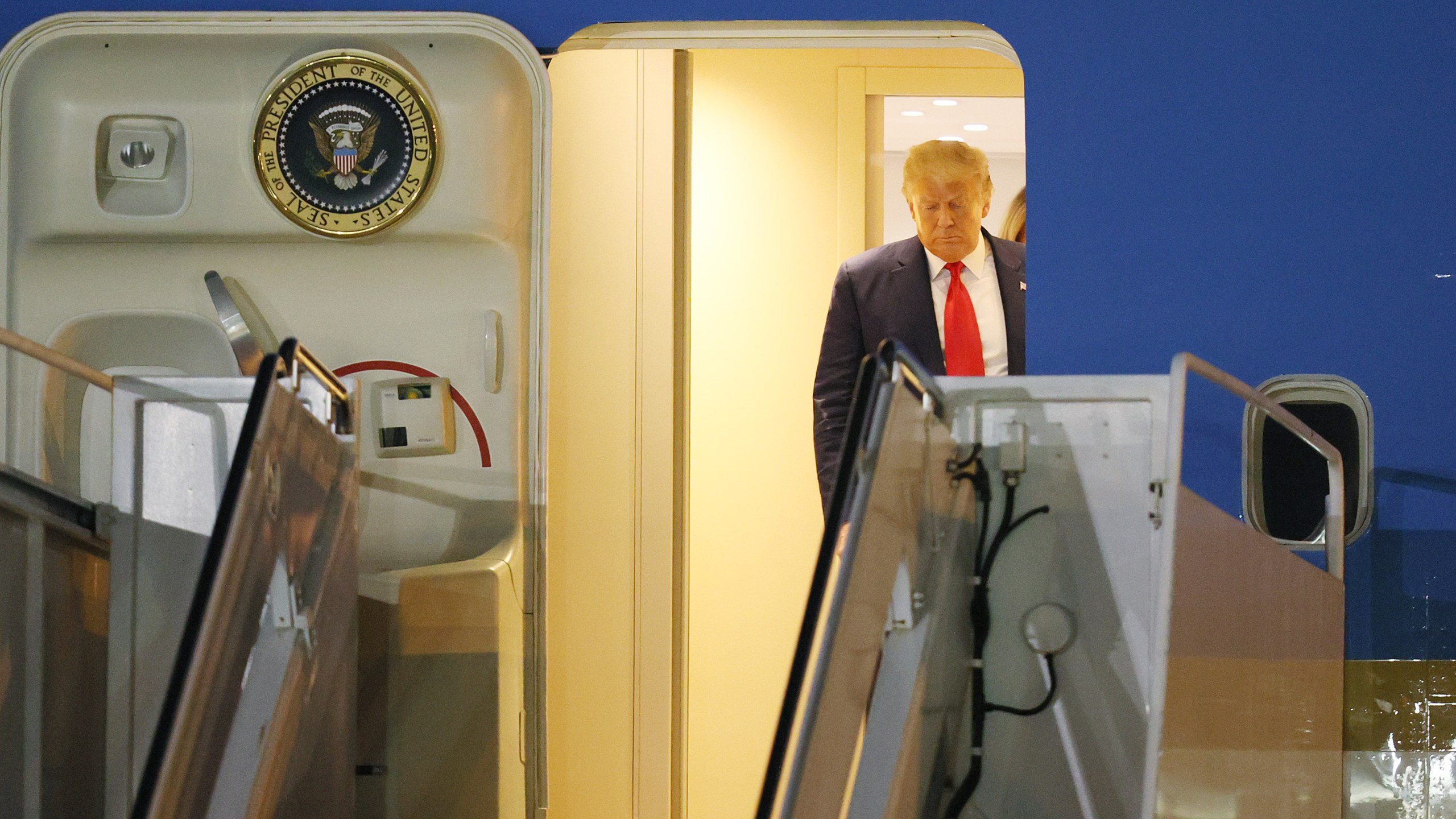 Donald Trump prepares to exit from Air Force One at the Palm Beach International Airport on Dec. 23, 2020 in West Palm Beach, Florida. (Joe Raedle/Getty Images)