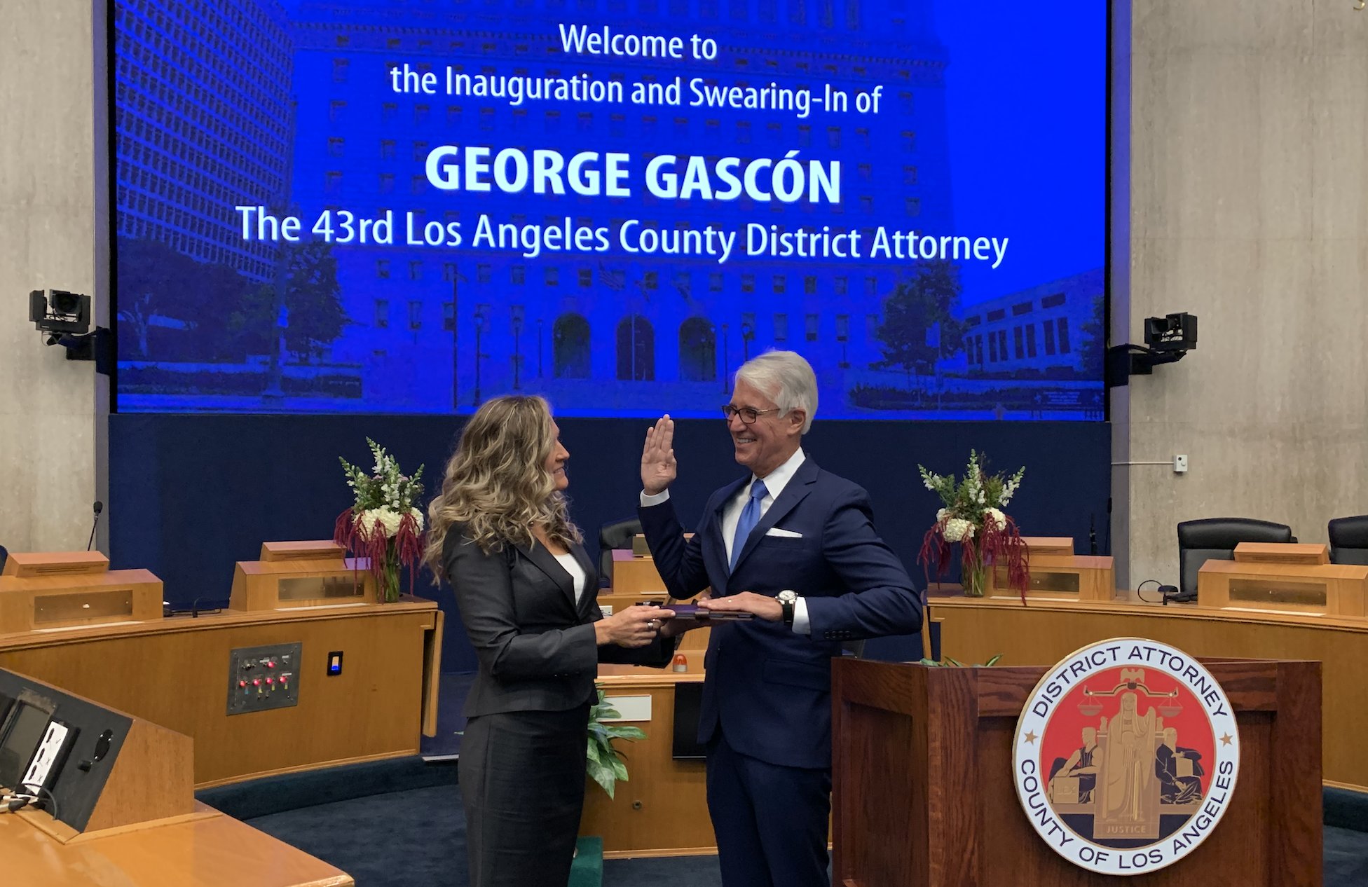 George Gascón is sworn in as L.A. County district attorney as his wife Fabiola Kramsky holds the Bible in downtown Los Angeles Monday, Dec. 7, 2020. (George Gascón/Twitter)