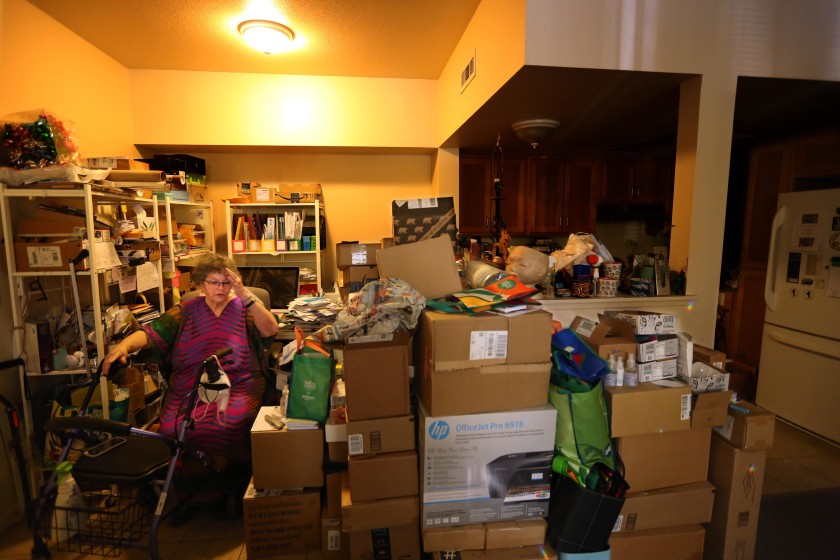 Linda Adrain, 80, is surrounded by her belongings in her 350-square-foot apartment in Santa Rosa. Her previous home in the Journey’s End mobile home park burned down in the Tubbs Fire in 2017. (Genaro Molina / Los Angeles Times)