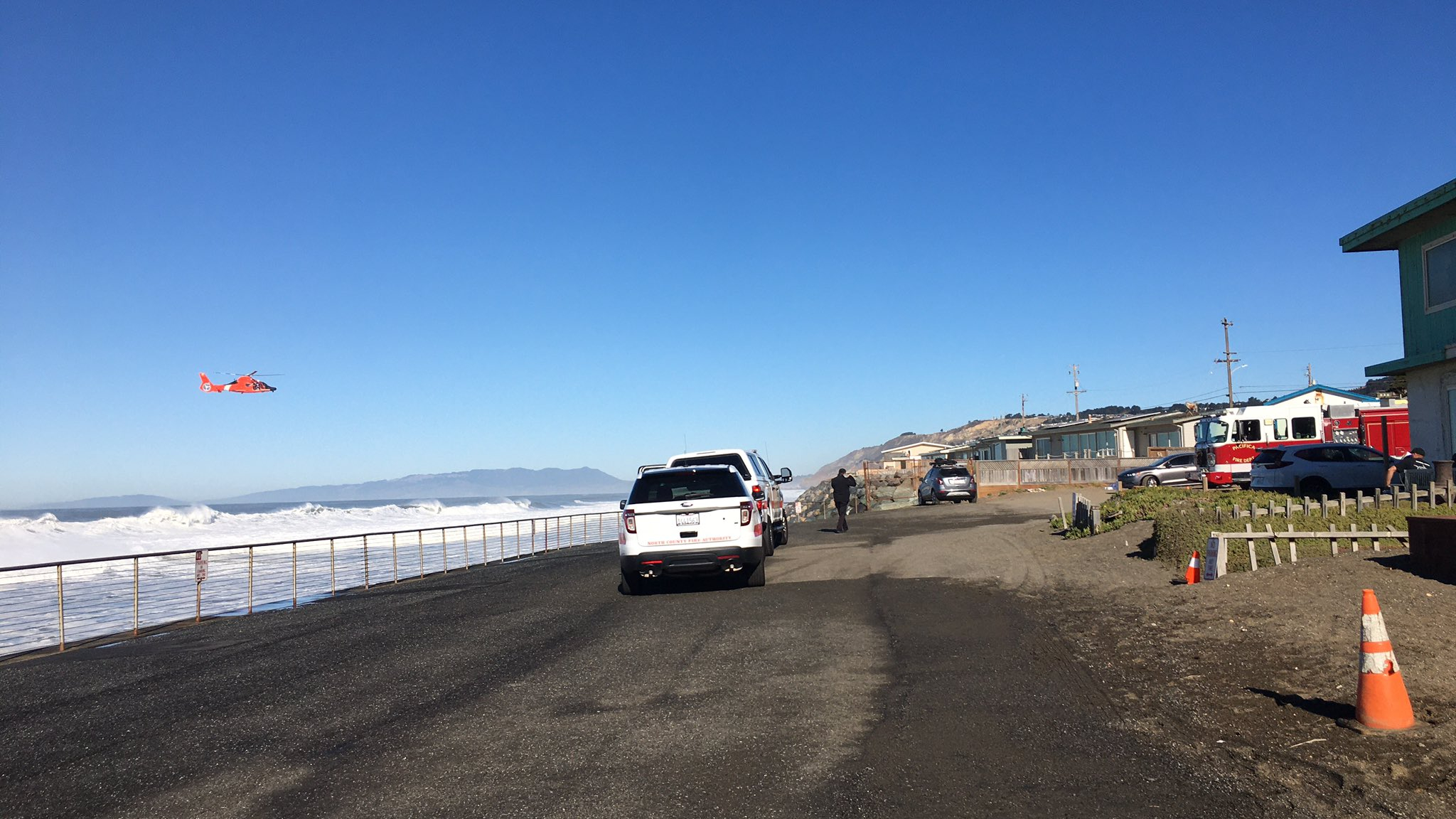 Authorities respond to assist the U.S. Coast Guard with a water rescue in Pacifica on Dec. 8, 2020, in a photo tweeted by the North County Fire Authority.