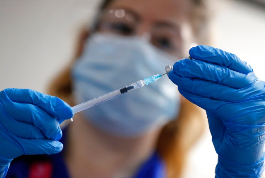 A nurse prepares a shot of the Pfizer-BioNTech COVID-19 vaccine at Guy's Hospital in London, on Dec. 8, 2020, as the U.K. health authorities rolled out a national mass vaccination program. (AP Photo/Frank Augstein, Pool)