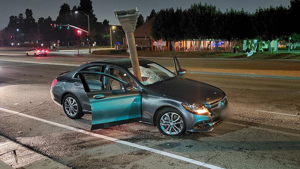 Tustin police released this photo on Dec. 12, 2020 of a car with a metal pole smashed into the windshield.