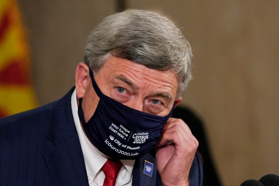 U.S. Census Director Steven Dillingham pauses as he listens to a question at a census news conference to urge Arizonans to participate in the nation's once-a-decade census population count Thursday, Sept. 17, 2020, in Phoenix. (AP Photo/Ross D. Franklin, Pool)