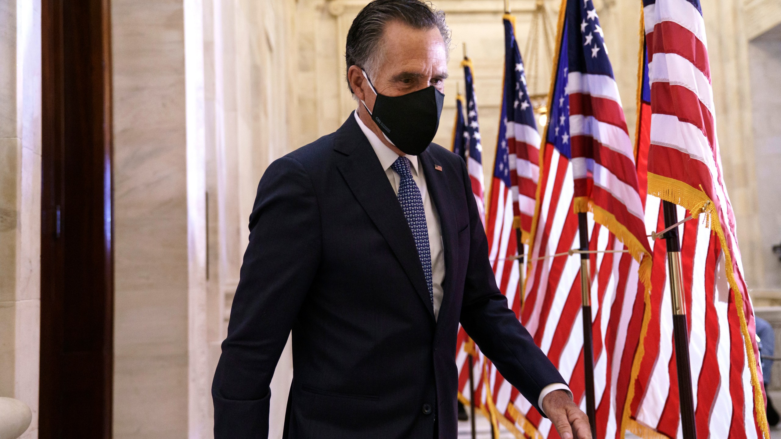 Sen. Mitt Romney, R-Utah, departs after the Republican Conference held leadership elections, on Capitol Hill in Washington, Tuesday, Nov. 10, 2020. (J. Scott Applewhite/AP Photo)