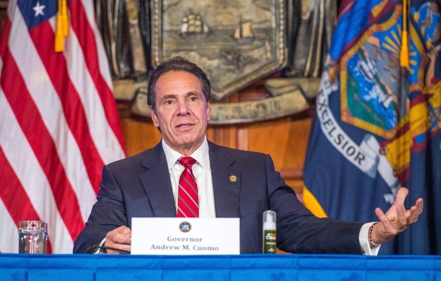 In this Wednesday, Nov. 18, 2020 photo provided by the Office of Governor Andrew M. Cuomo, Gov. Cuomo holds a press briefing on the coronavirus in the Red Room at the State Capitol in Albany, N.Y. (Darren McGee/Office of Governor Andrew M. Cuomo via AP)