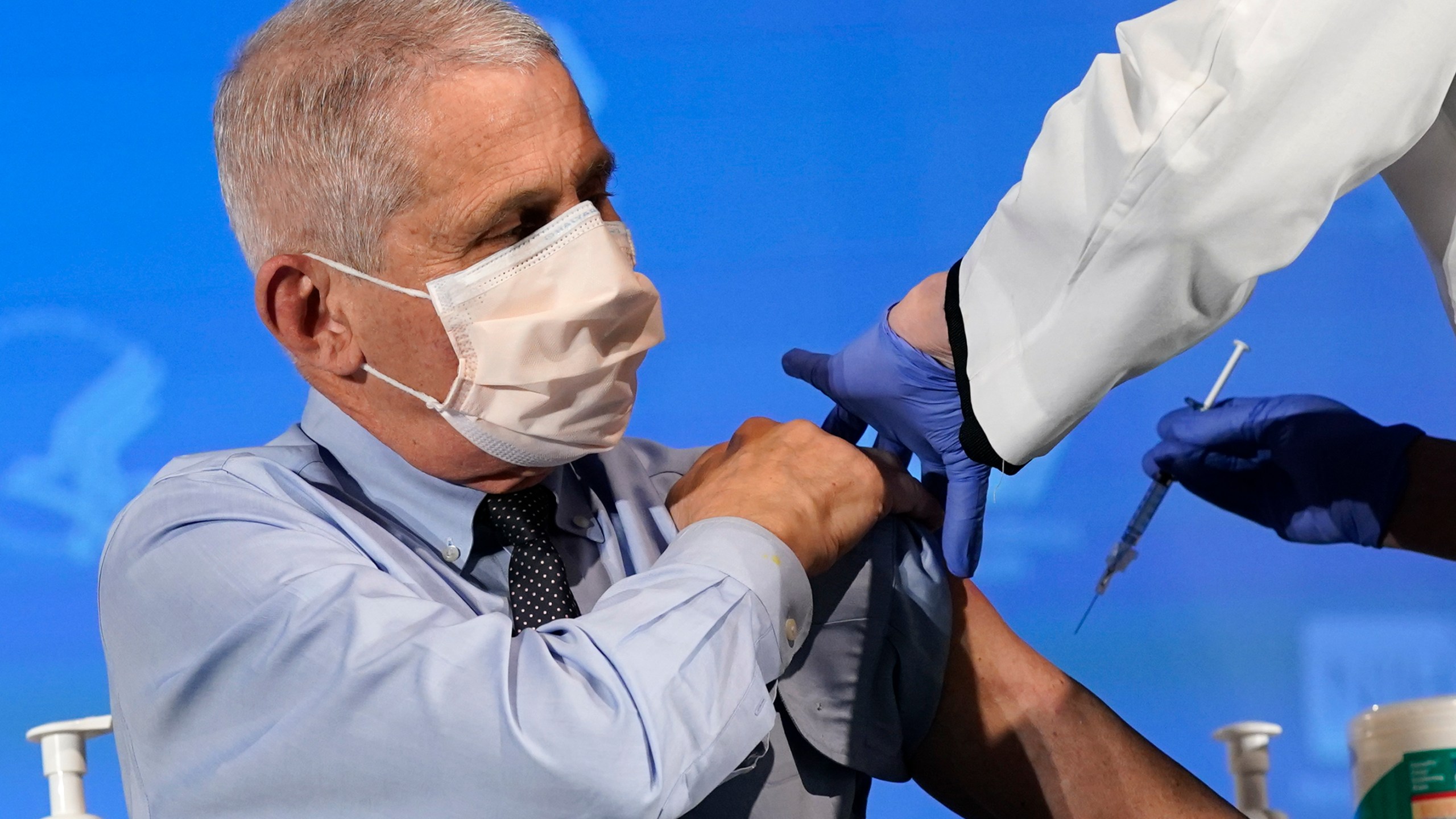 In this Dec. 22, 2020, file photo Dr. Anthony Fauci, director of the National Institute of Allergy and Infectious Diseases, prepares to receive his first dose of the COVID-19 vaccine at the National Institutes of Health in Bethesda, Md. (Patrick Semansky, Pool/AP Photo)