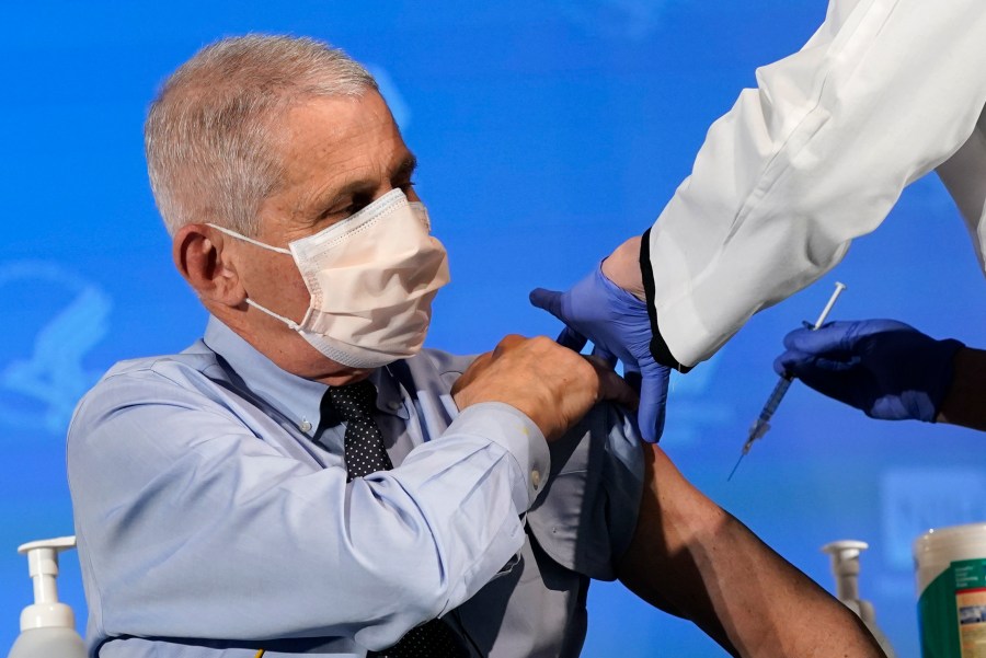 In this Dec. 22, 2020, file photo Dr. Anthony Fauci, director of the National Institute of Allergy and Infectious Diseases, prepares to receive his first dose of the COVID-19 vaccine at the National Institutes of Health in Bethesda, Md. (Patrick Semansky, Pool/AP Photo)