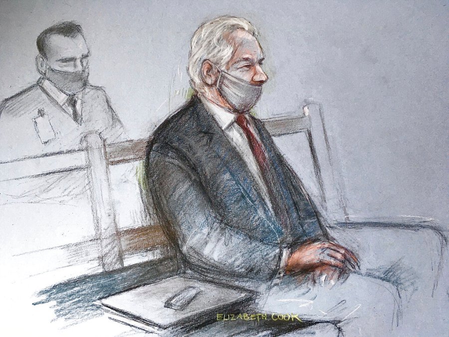 This is a court artist sketch by Elizabeth Cook of Julian Assange appearing at the Old Bailey in London for the ruling in his extradition case, in London, Monday, Jan. 4, 2021. (Elizabeth Cook/PA via AP)