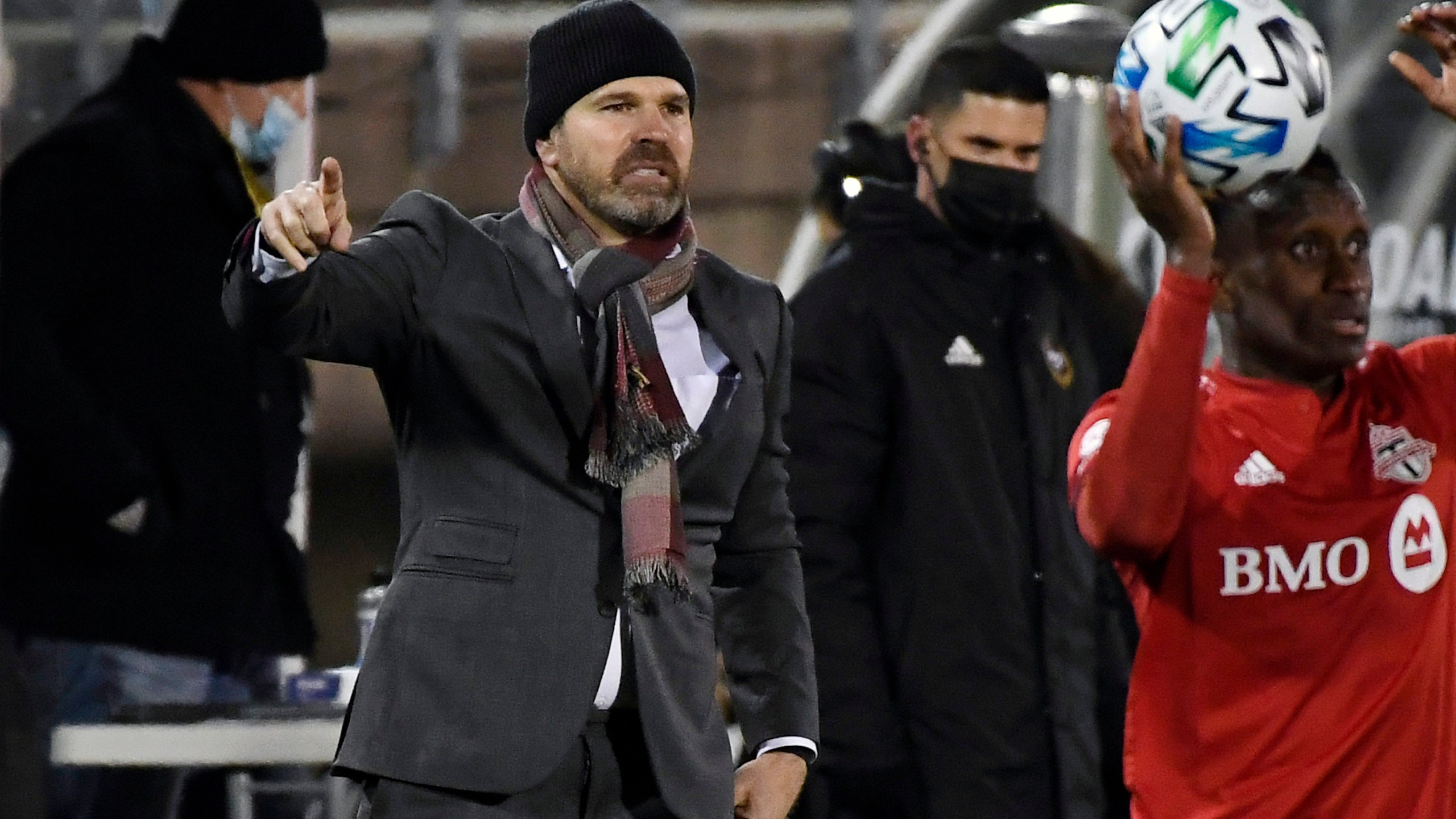 In this Nov. 24, 2020, file photo, then-Toronto FC head coach Greg Vanney, left, calls out to his team during the first half of an MLS soccer playoff match against Nashville SC in East Hartford, Conn. (Jessica Hill/Associated Press)