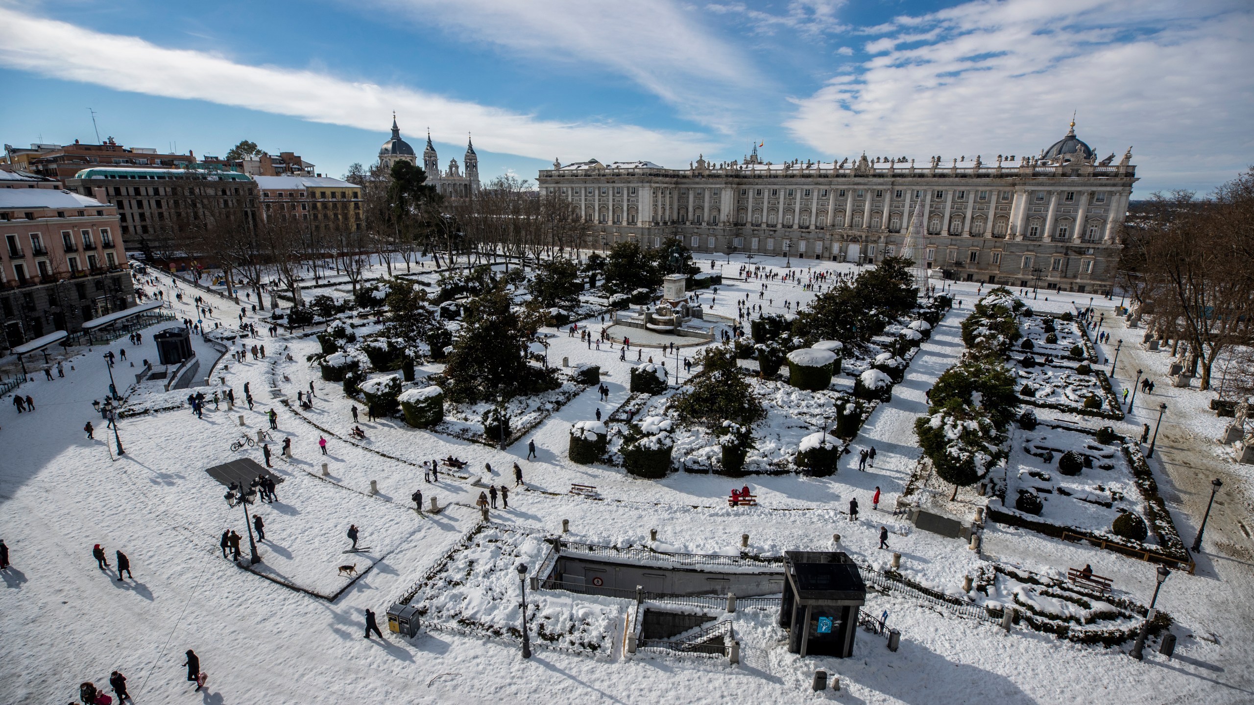 A view of Oriente square covered with snow with the Royal Palace in front in downtown Madrid is seen on Jan. 10, 2021. (Manu Fernandez/Associated Press)