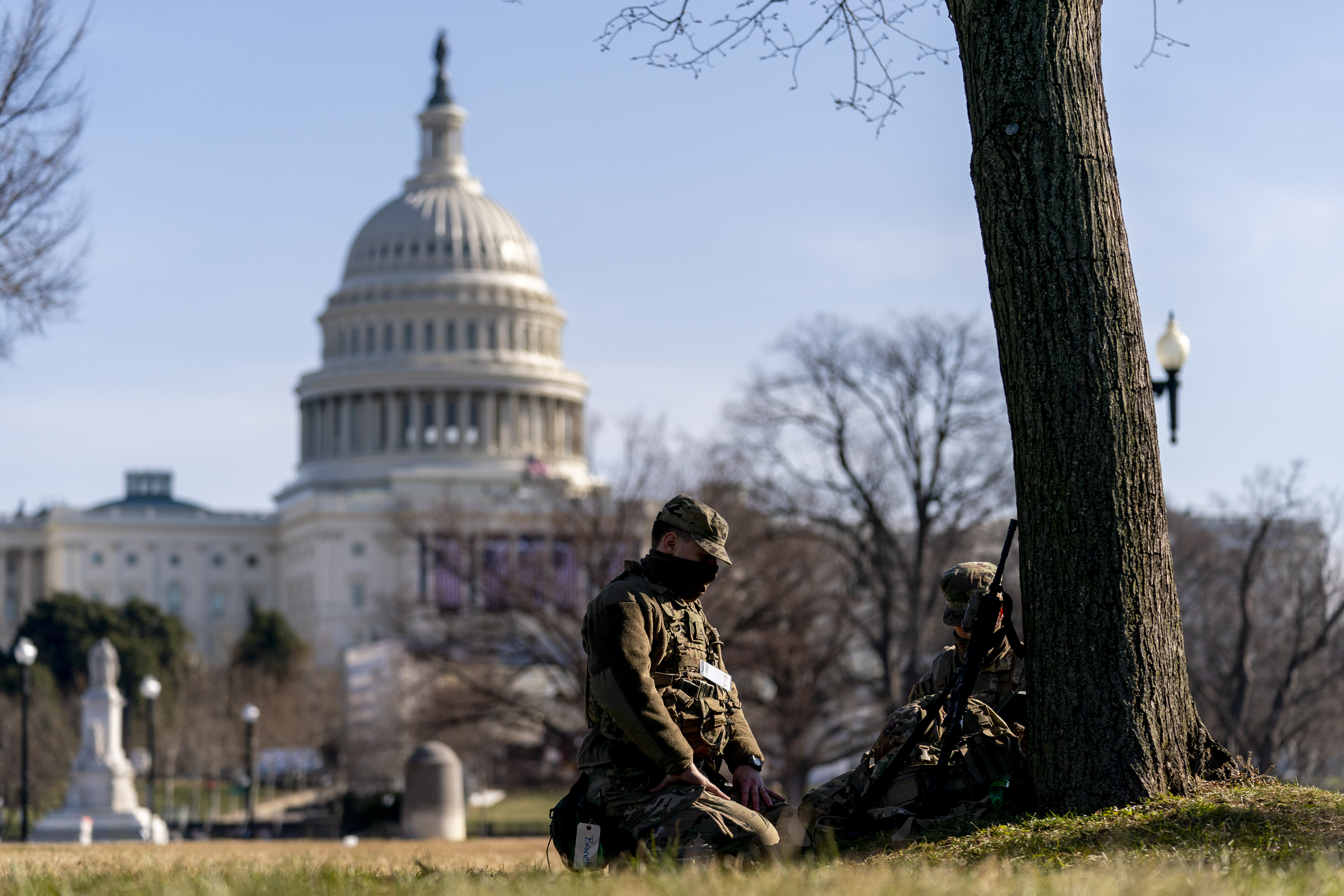 Members of the National Guard work outside the U.S Capitol building on Capitol Hill in Washington on Jan. 14, 2021. (AP Photo/Andrew Harnik)