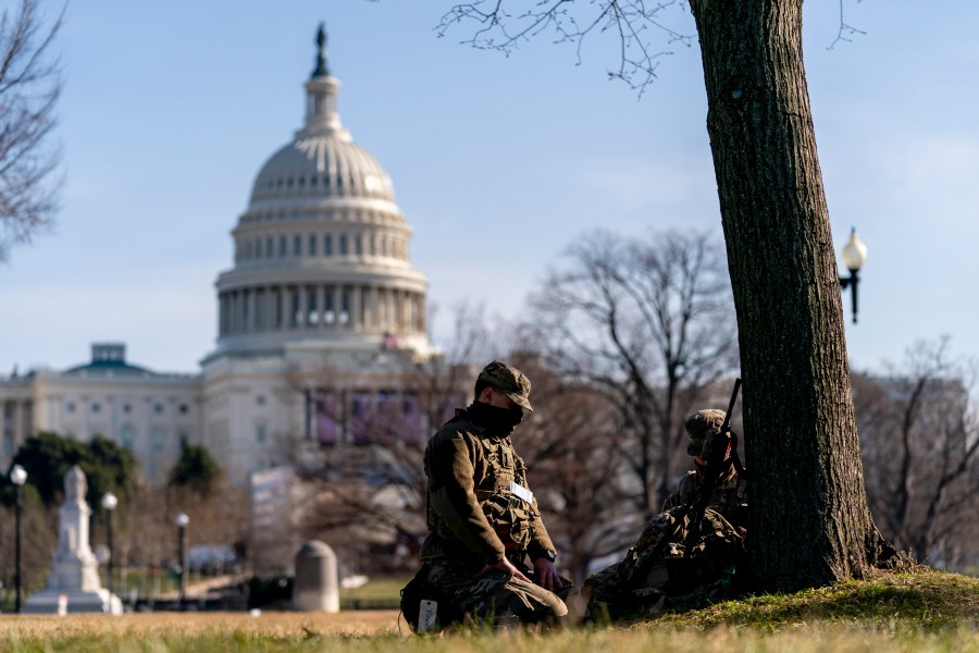 Members of the National Guard work outside the U.S Capitol building on Capitol Hill in Washington on Jan. 14, 2021. (AP Photo/Andrew Harnik)