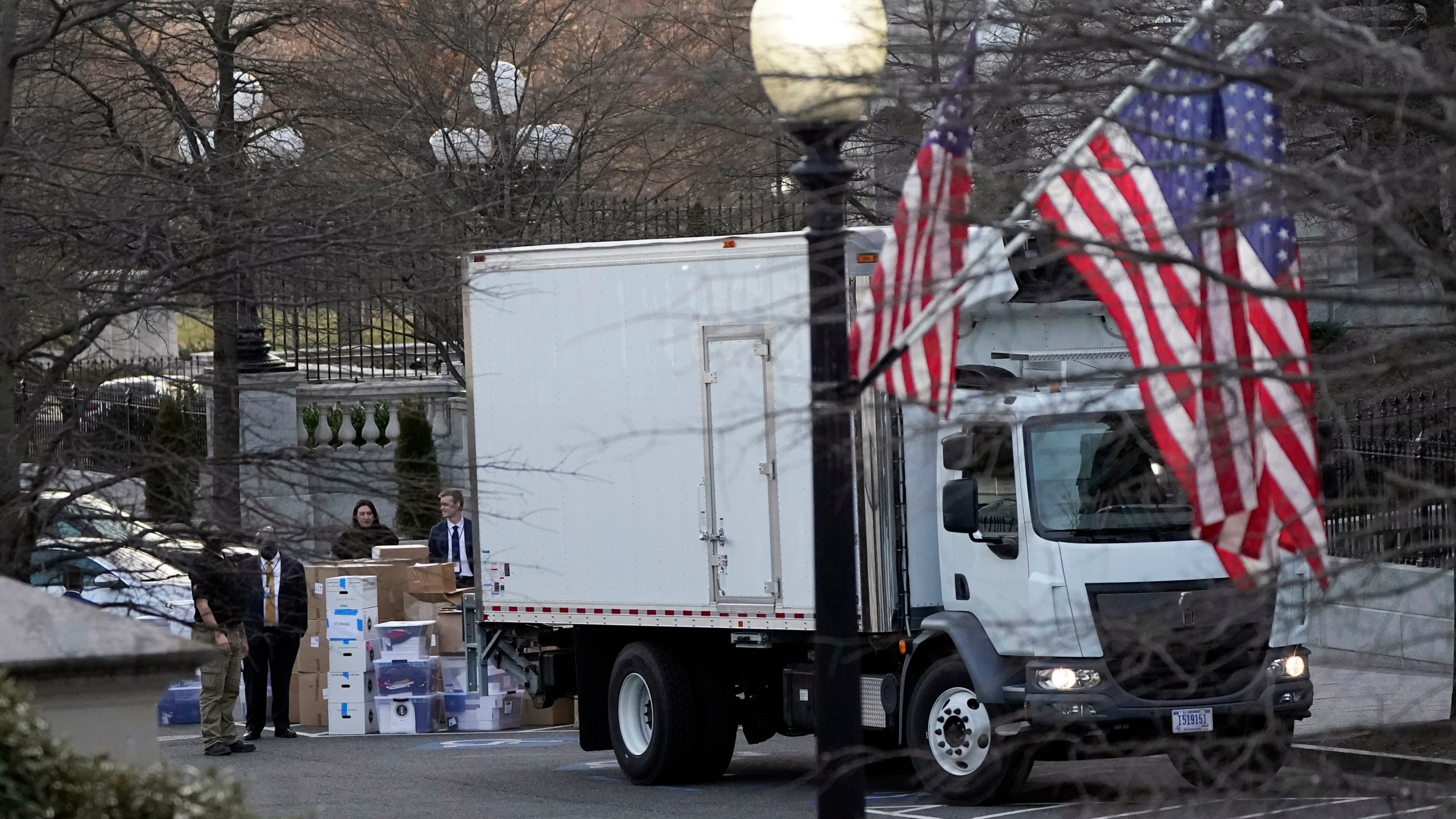 A van arrives to pick up boxes that were moved out of the Eisenhower Executive Office building, inside the White House complex on Jan. 14, 2021, in Washington D.C. (AP Photo/Gerald Herbert)