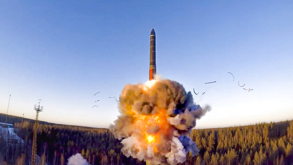 In this file photo taken from a video distributed by Russian Defense Ministry Press Service, on Wednesday, Dec. 9, 2020, a rocket launches from missile system as part of the drills, a ground-based intercontinental ballistic missile was launched from the Plesetsk facility in northwestern Russia. (Russian Defense Ministry Press Service via AP, File)