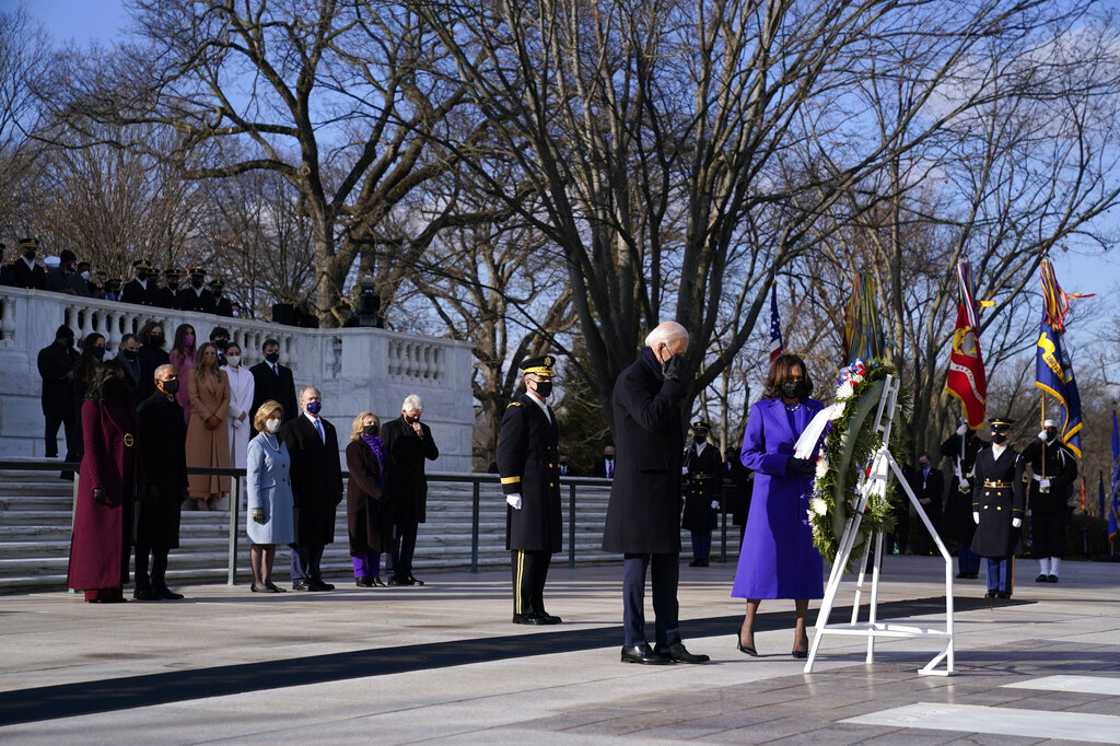 President Joe Biden and Vice President Kamala Harris participate in a wreath laying ceremony at the Tomb of the Unknown Soldier at Arlington National Cemetery in Arlington, Va.(AP Photo/Evan Vucci)