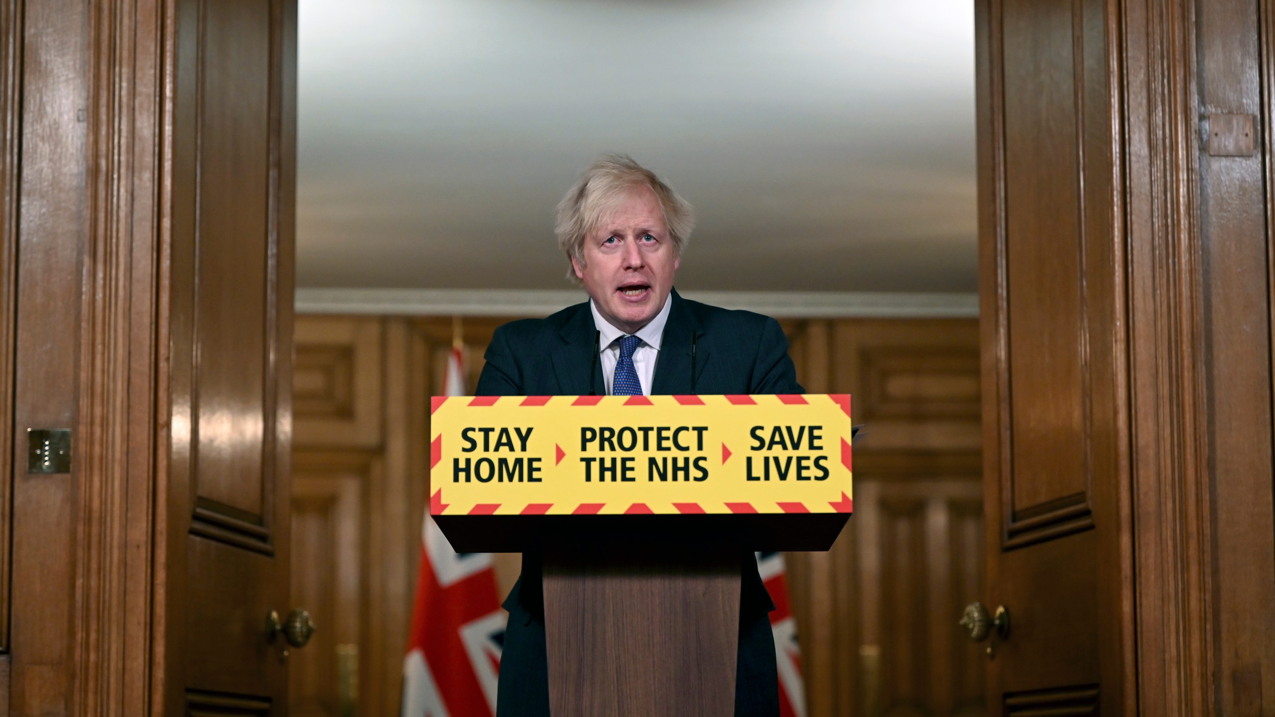 Britain's Prime Minister Boris Johnson speaks during a coronavirus press conference at 10 Downing Street in London, Friday Jan. 22, 2021. Johnson announced that the new variant of COVID-19, which was first discovered in the south of England, may be linked with an increase in the mortality rate. (Leon Neal/Pool via AP)