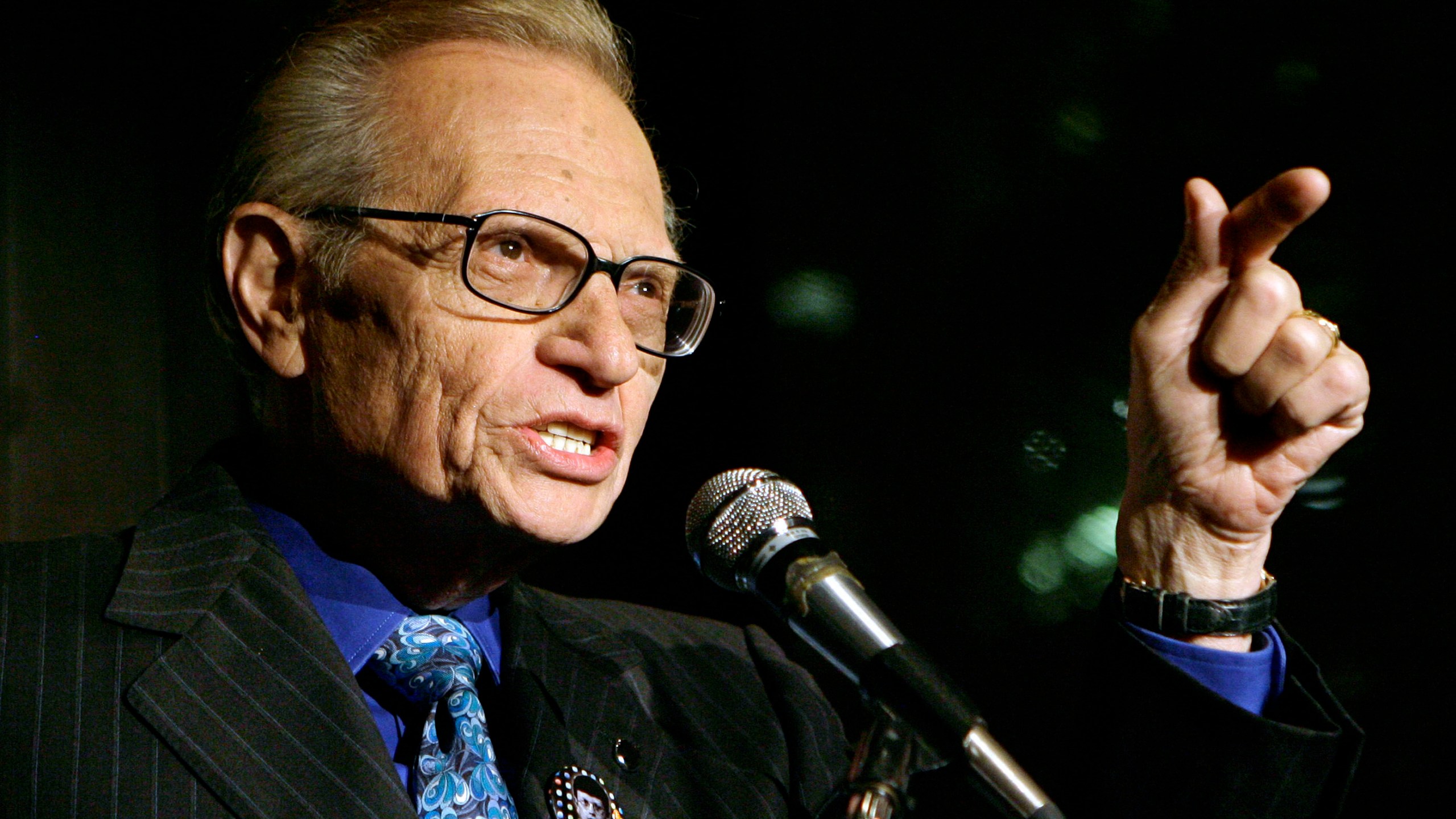 In this April 18, 2007 file photo, Larry King speaks to guests at a party held by CNN, celebrating King's fifty years of broadcasting in New York. (AP Photo/Stuart Ramson, File)