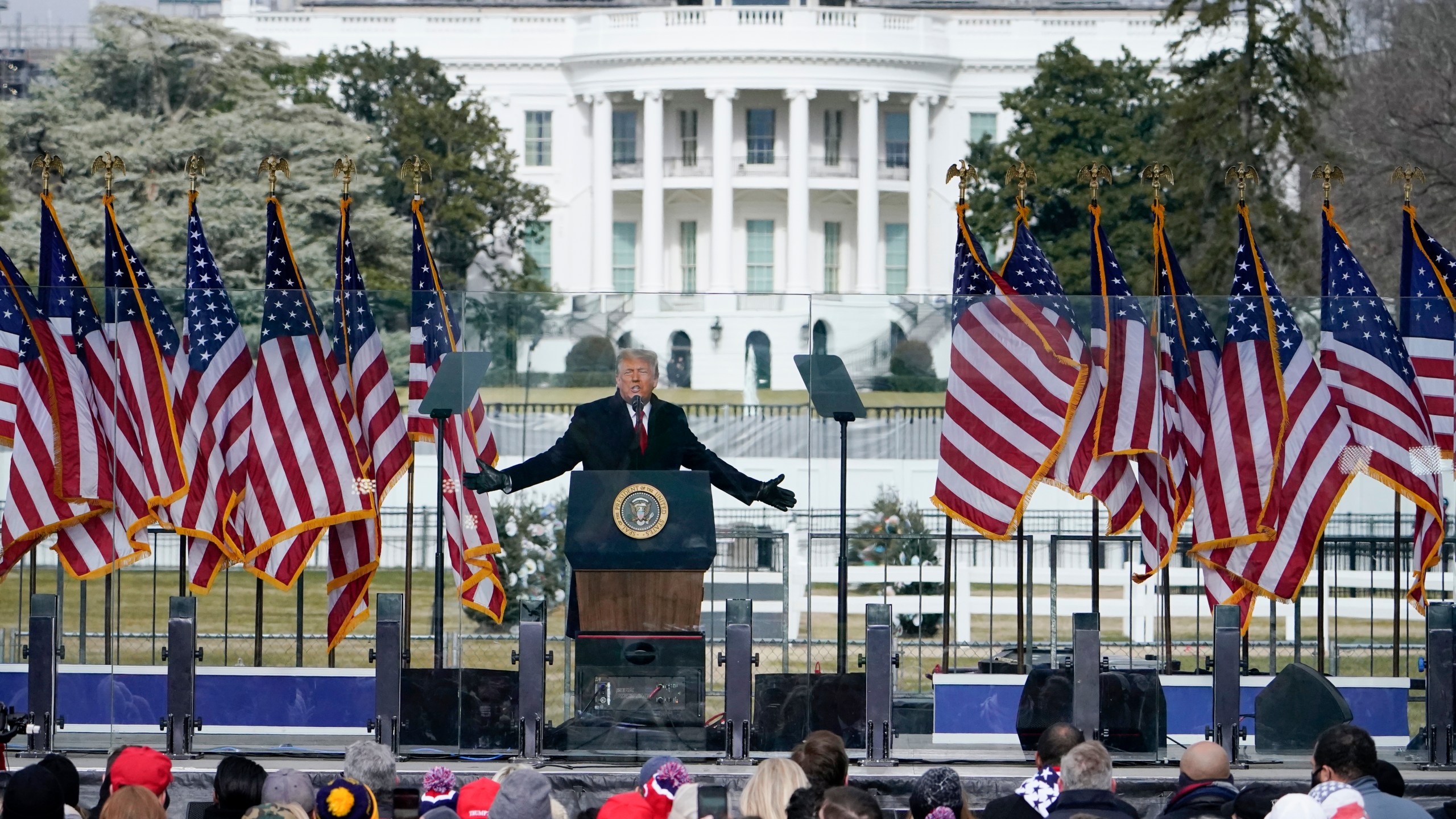 In this Jan. 6, 2021, file photo with the White House in the background, President Donald Trump speaks at a rally in Washington. (AP Photo/Jacquelyn Martin, File)