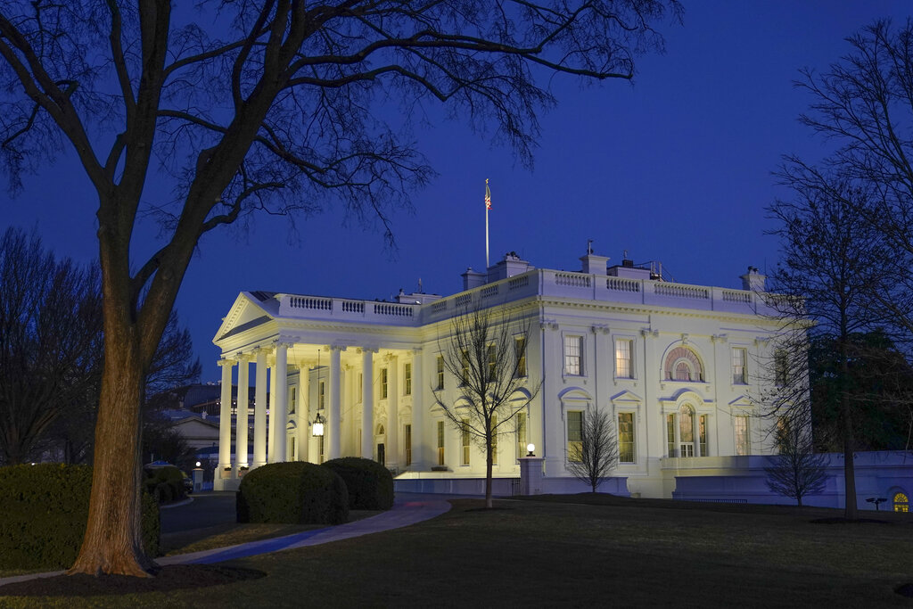 Dusk settles over the White House in Washington Jan. 23, 2021. (AP Photo/Patrick Semansky)