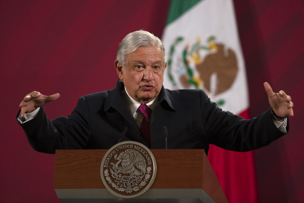 In this Dec. 18, 2020 file photo, Mexican President Andres Manuel Lopez Obrador gives his daily, morning news conference at the presidential palace, Palacio Nacional, in Mexico City. (AP Photo/Marco Ugarte, File)