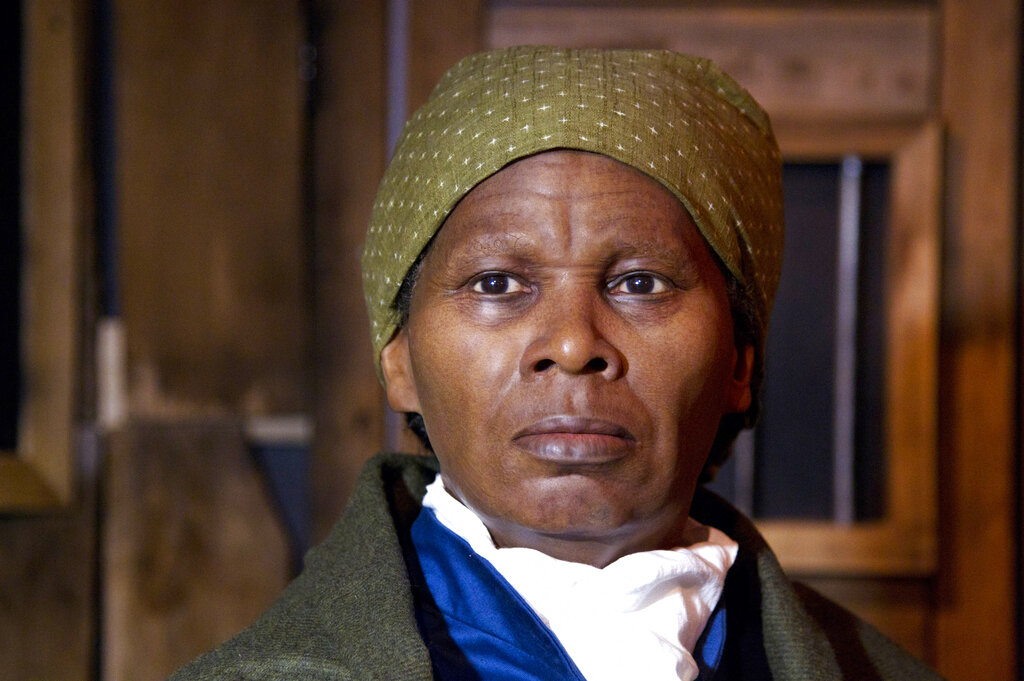 In this Feb. 7, 2012 file photo, a wax likeness of the renowned abolitionist and conductor of the Underground Railroad Harriet Ross Tubman is unveiled at the Presidents Gallery by Madame Tussauds in Washington. (AP Photo/Manuel Balce Ceneta)