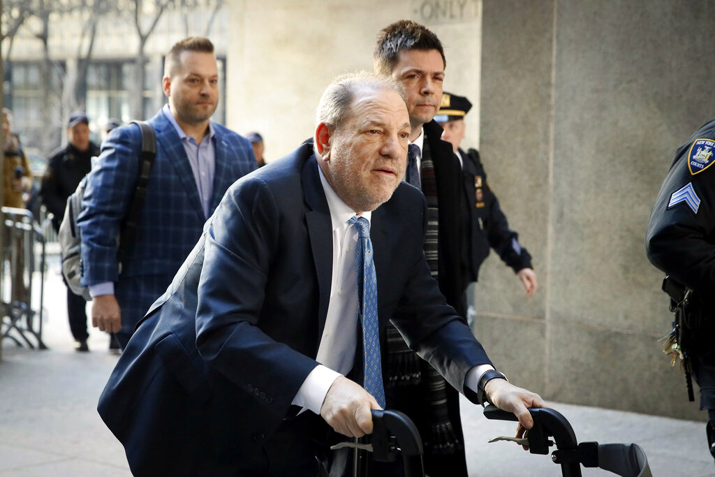 In this Feb. 24, 2020, file photo, Harvey Weinstein arrives at a Manhattan courthouse as jury deliberations continue in his rape trial in New York. (AP Photo/John Minchillo, File)