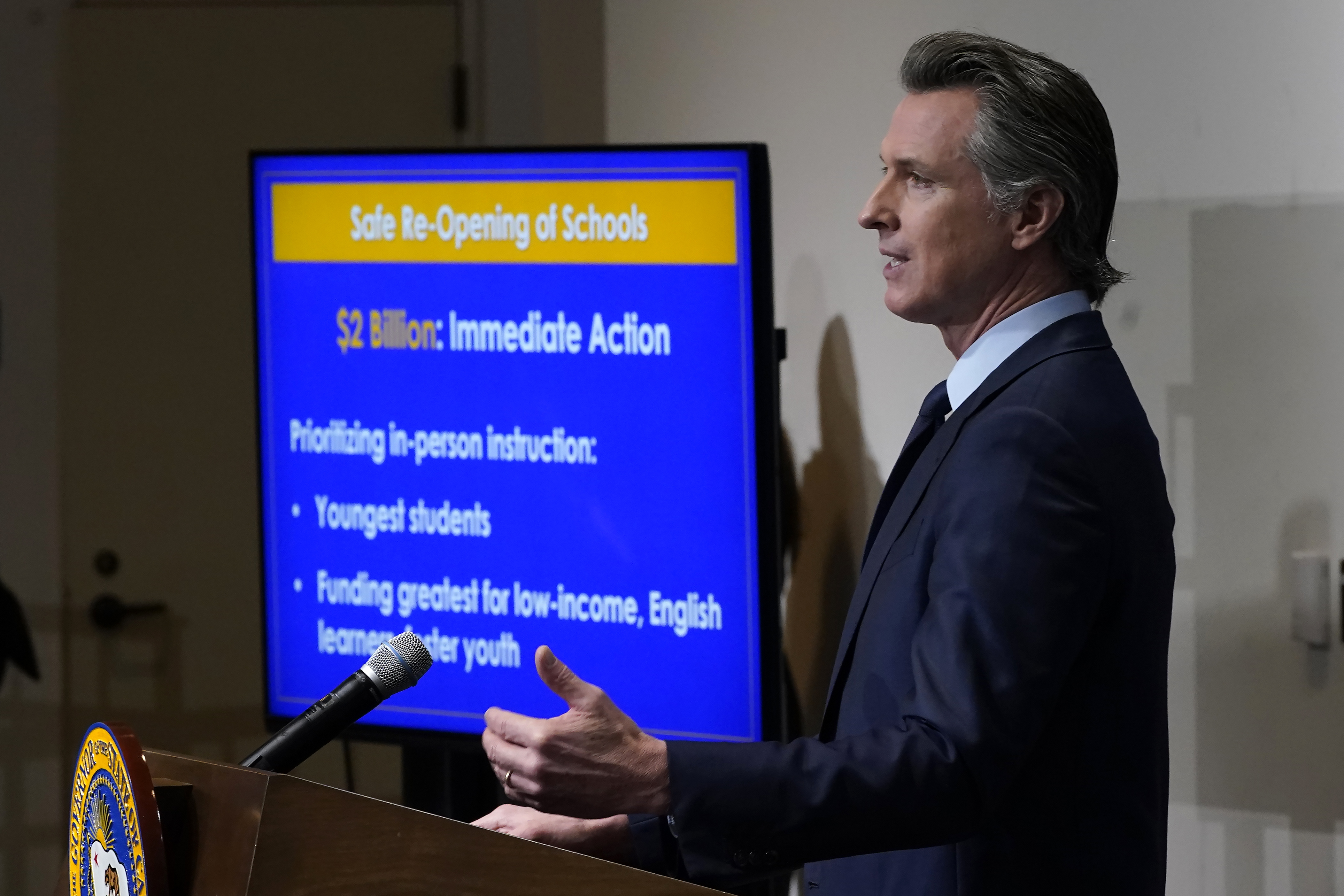 In this Jan. 8, 2021, file photo, California Gov. Gavin Newsom outlines the safe re-opening of schools while speaking about his 2021-2022 state budget proposal during a news conference in Sacramento, Calif. (AP Photo/Rich Pedroncelli)