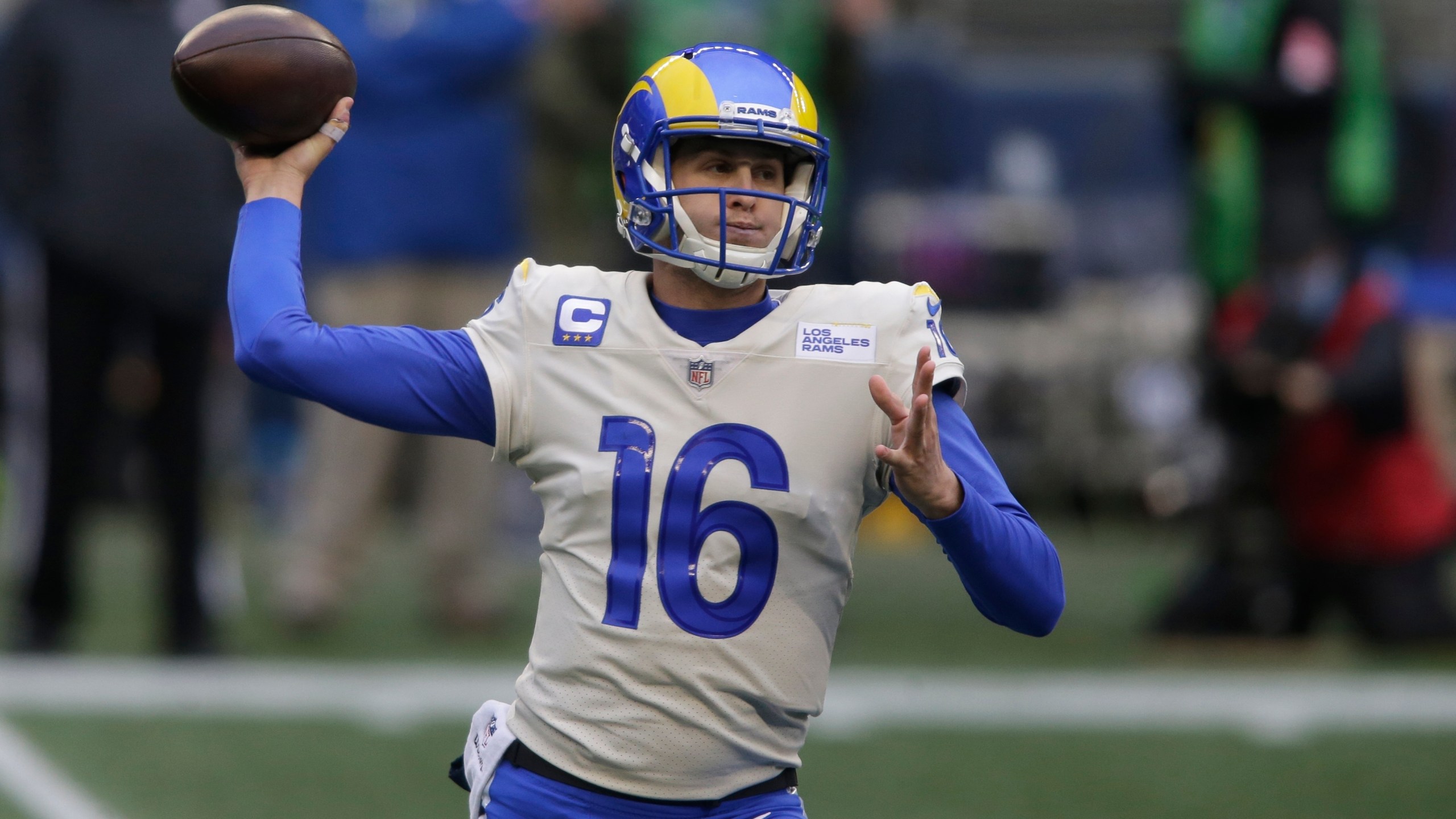 In this Jan. 9, 2021, file photo, Los Angeles Rams quarterback Jared Goff throws a pass against the Seattle Seahawks during the first half of an NFL wild-card playoff football game in Seattle. (AP Photo/Scott Eklund)