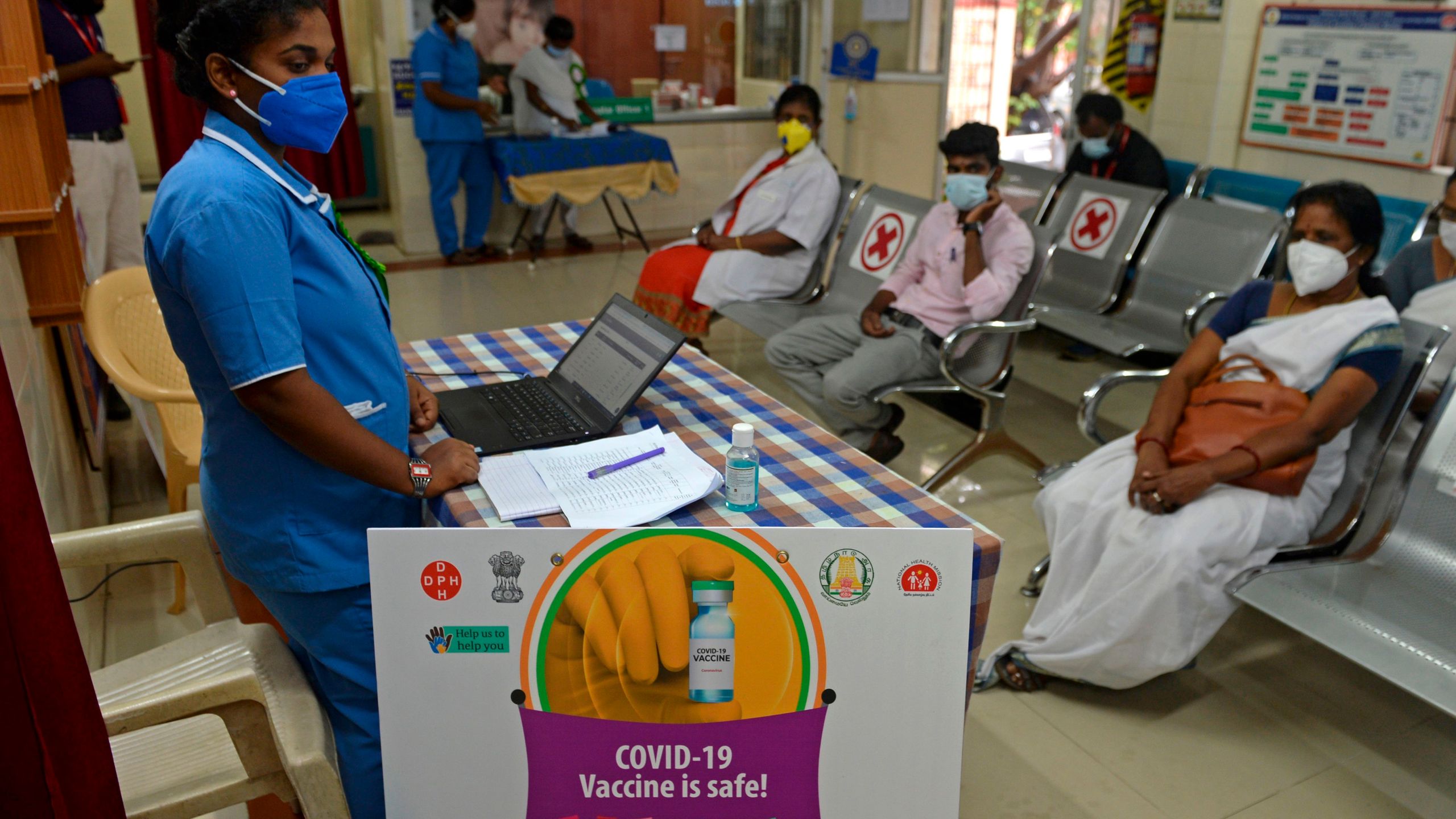 Health officials take part in a dry run or mock drill for COVID-19 vaccine delivery at a primary health center in Chennai on Jan. 2, 2021. (ARUN SANKAR/AFP via Getty Images)