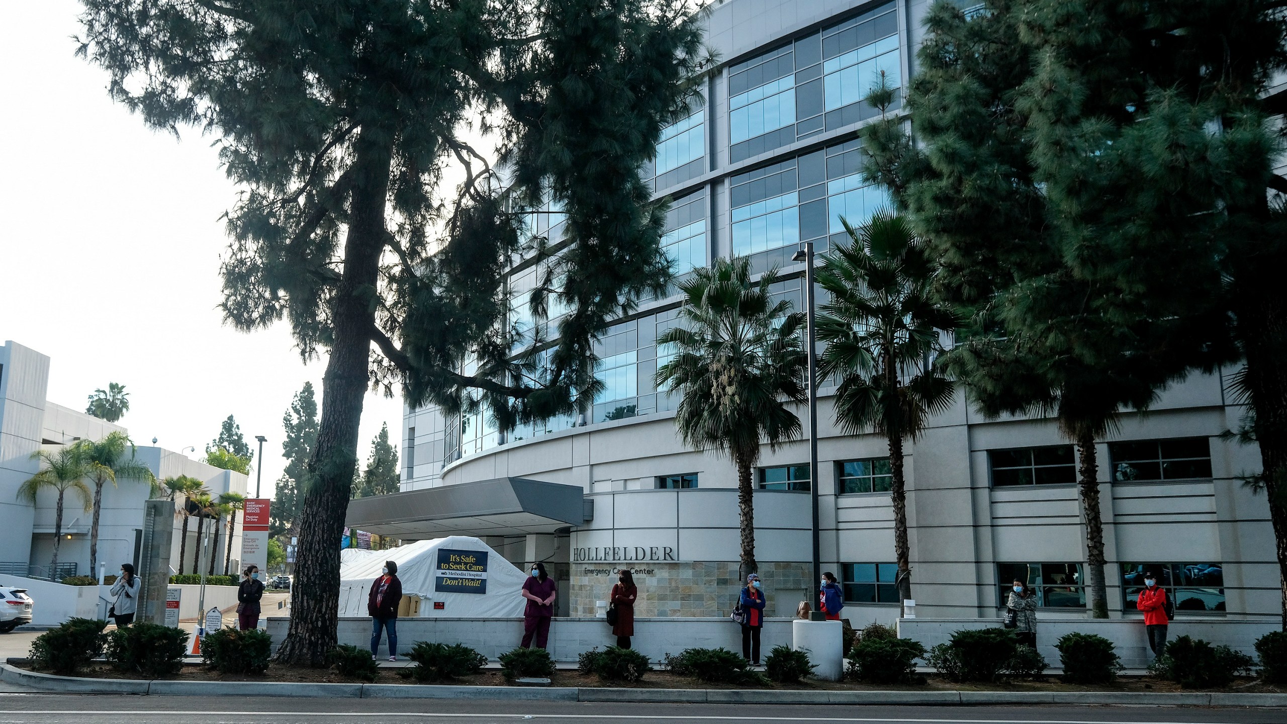 Nurses take part in a socially distant silent event to protest Methodist Hospital of Southern California's use of a state waiver to allegedly "circumvent RN-to-patient safe staffing standards," in Arcadia, California, on Jan. 2, 2021. (RINGO CHIU/AFP via Getty Images)