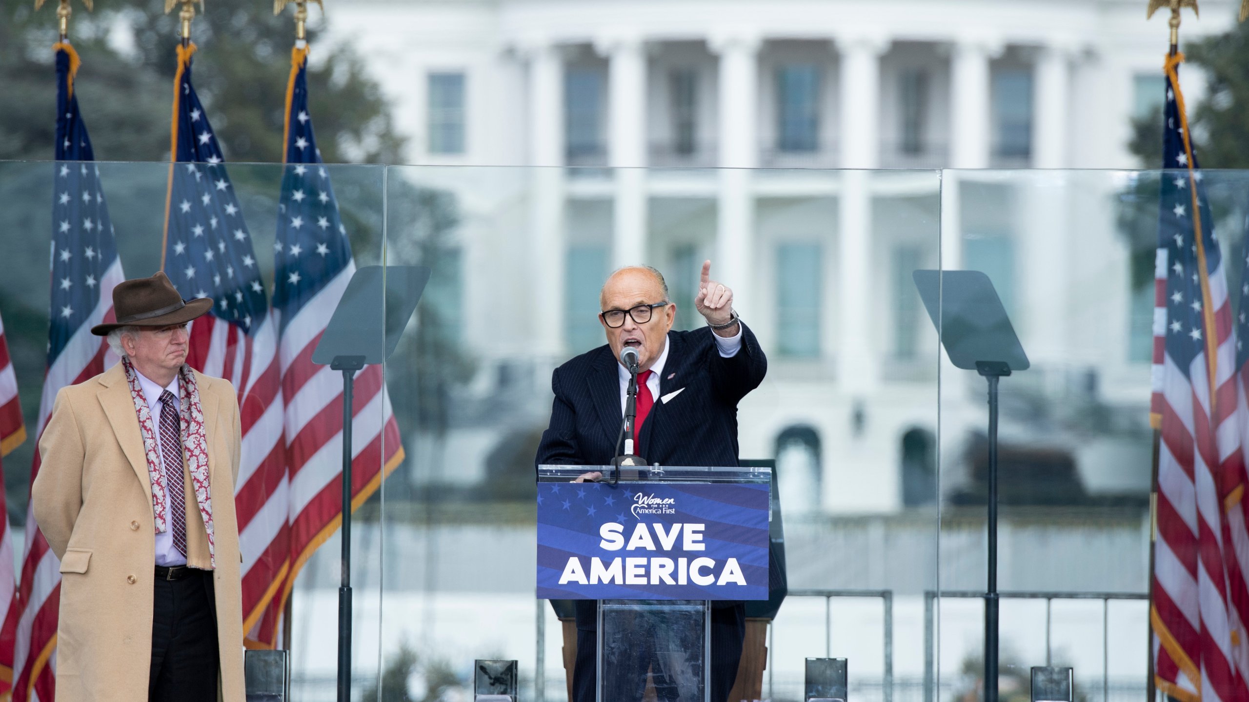 Chapman University professor John Eastman stands next to Rudy Giuliani during a rally near the White House in Washington, D.C., on Wednesday, Jan. 6, 2021. (BRENDAN SMIALOWSKI/AFP via Getty Images)