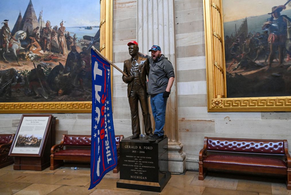 Supporters of President Donald Trump enter the US Capitol's Rotunda on January 6, 2021, in Washington, DC. (SAUL LOEB/AFP via Getty Images)