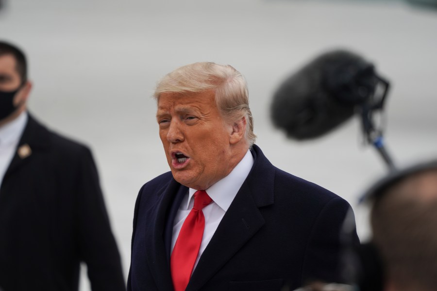 President Donald Trump greets his supporters at Valley International Airport in Harlingen, Texas, on Jan. 12, 2021. (Go Nakamura / Getty Images)