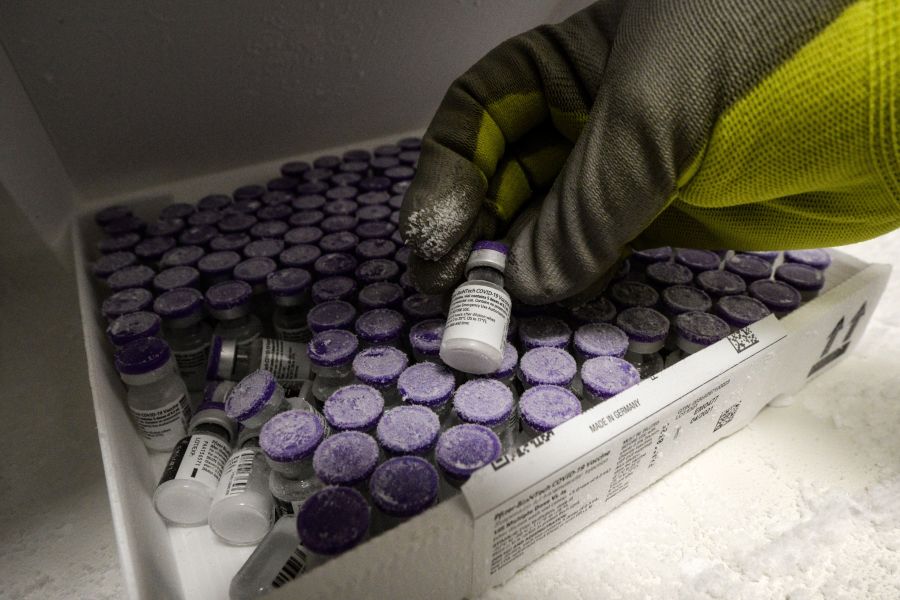 A picture taken on Jan. 15, 2021, shows a pharmacist holding a vial of the Pfizer COVID-19 vaccine . (JEAN-FRANCOIS MONIER/AFP via Getty Images)