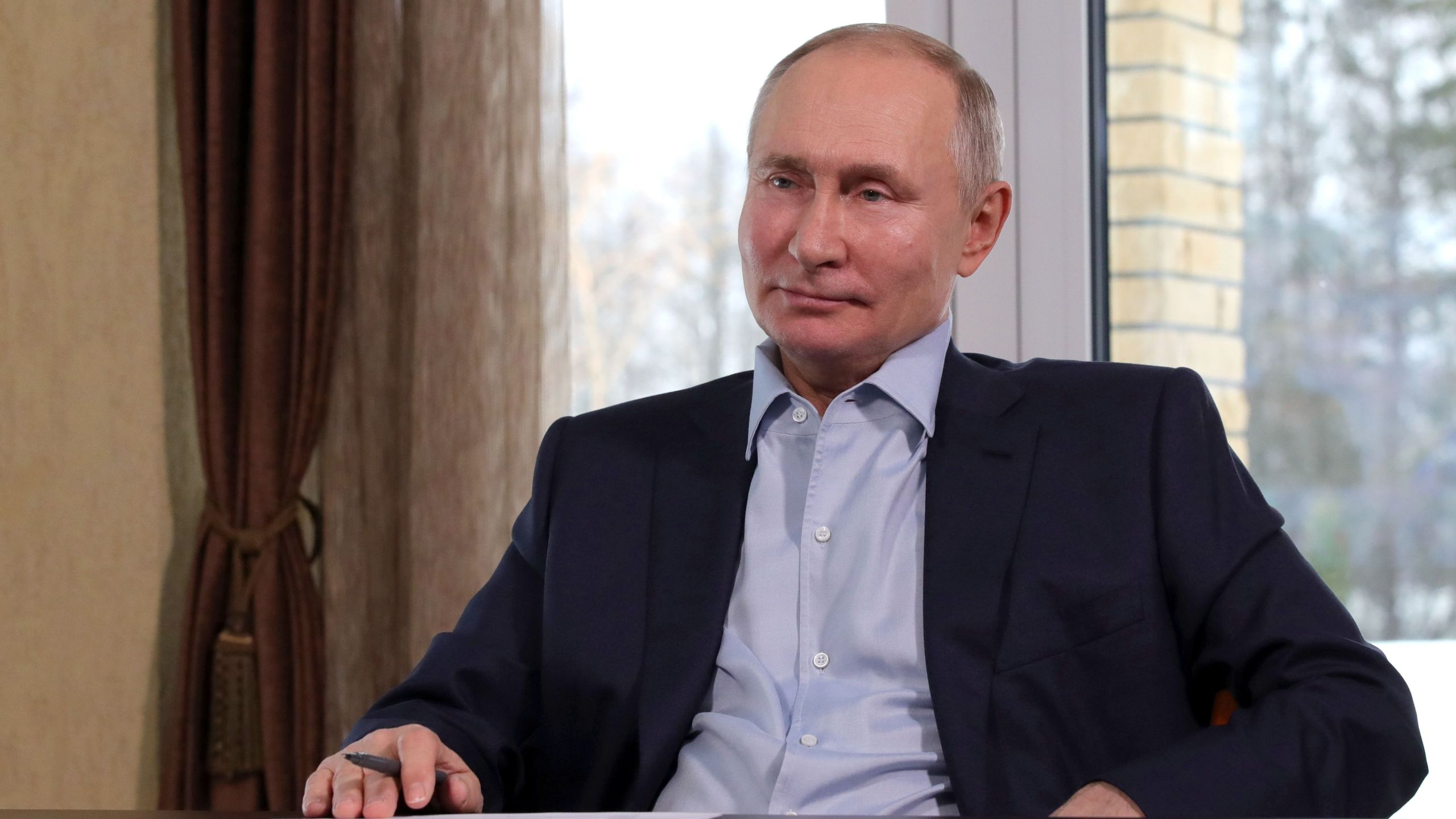 Russian President Vladimir Putin holds a meeting with Russian students via a videoconference at a residence in Zavidovo, Tver region, on the Students' Day on Jan. 25, 2021. (Mikhail KLIMENTYEV / SPUTNIK AFP via Getty Images)