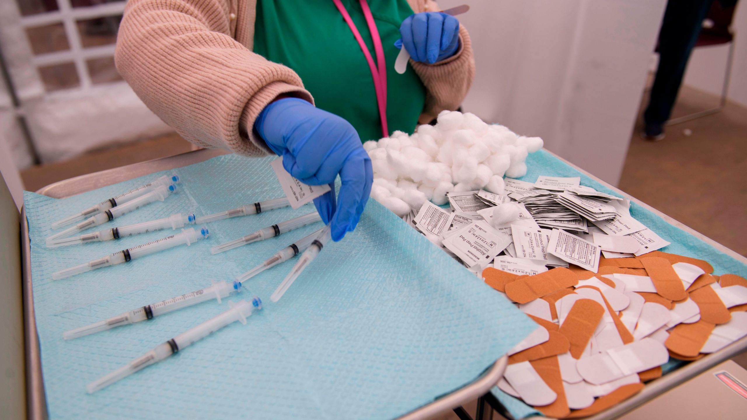 Syringes filled with a dose of the Covid-19 vaccine await to be administered at the Kedren Community Health Center on Jan. 25, 2021, in Los Angeles. (PATRICK T. FALLON/AFP via Getty Images)