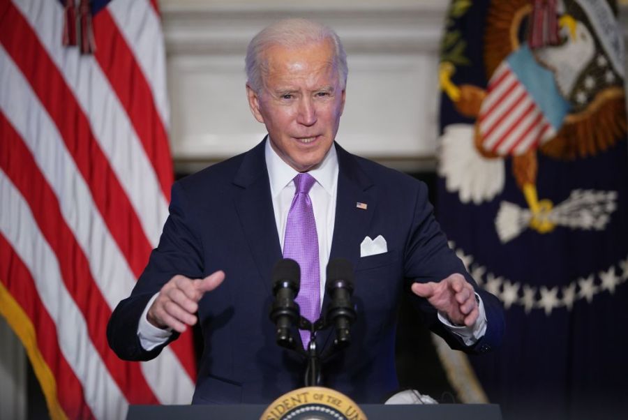 US President Joe Biden speaks on COVID-19 response in the State Dining Room of the White House in Washington, DC on Jan. 26, 2021.(MANDEL NGAN/AFP via Getty Images)